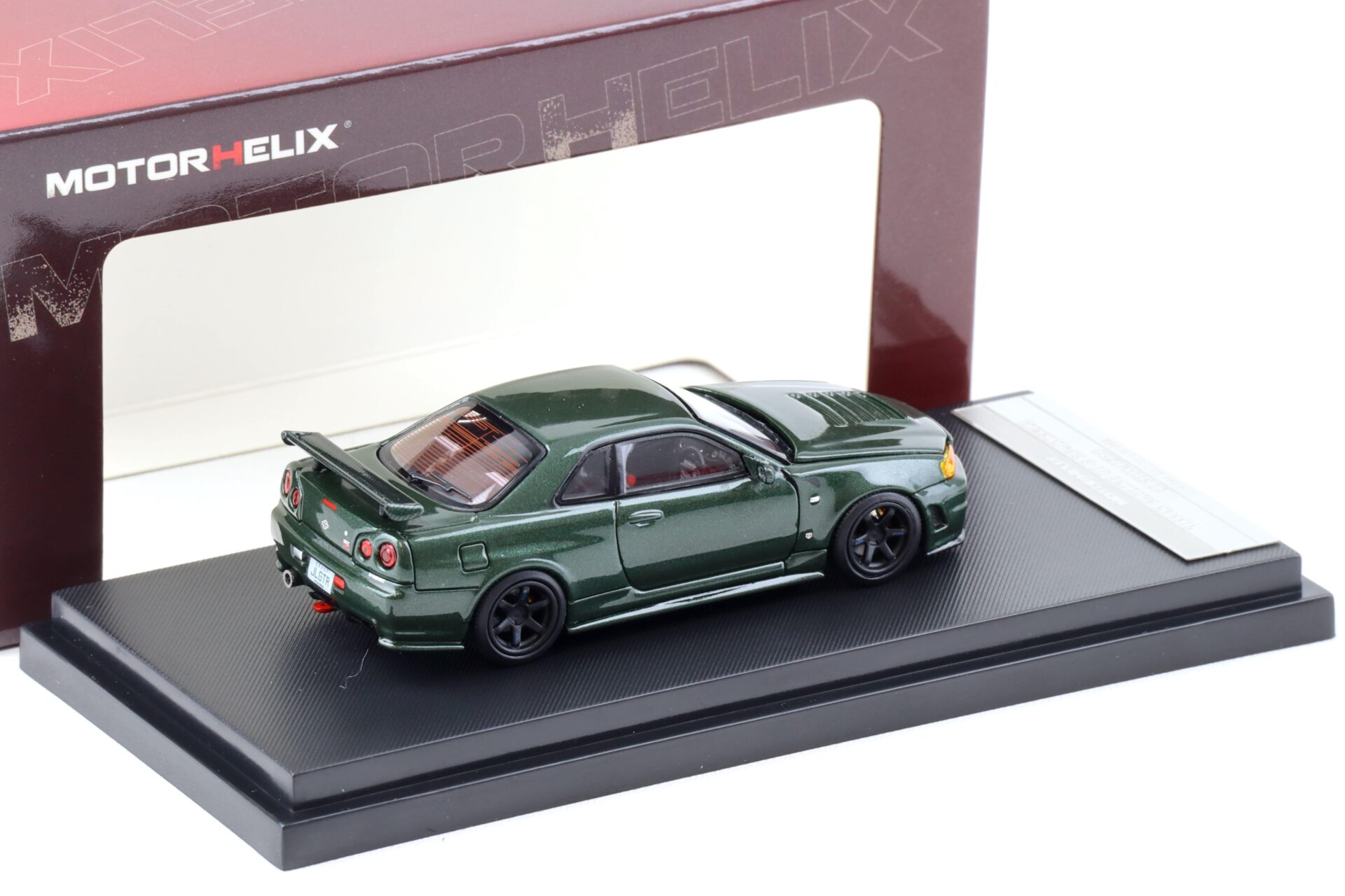 1:64 Motorhelix Nissan Skyline GT-R R34 Nismo CRS dark green M63421