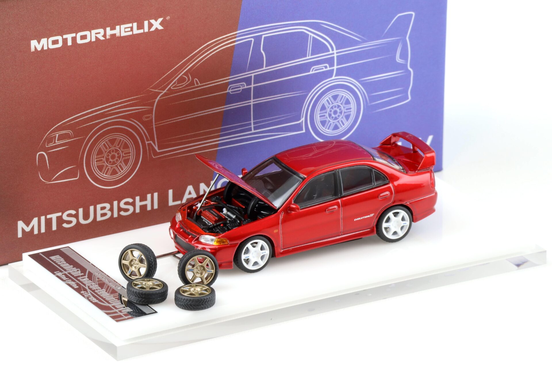 1:64 Motorhelix Mitsubishi Lancer Evolution IV Metal red + wheels HEC EXPO