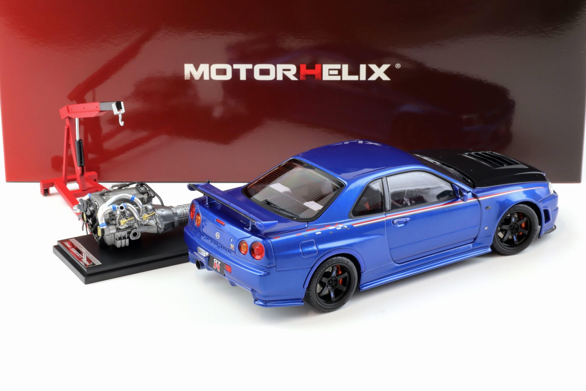 1:18 Motorhelix Nissan Skyline GT-R R34 Nismo CRS Bayside blue/ Carbon hood M83430