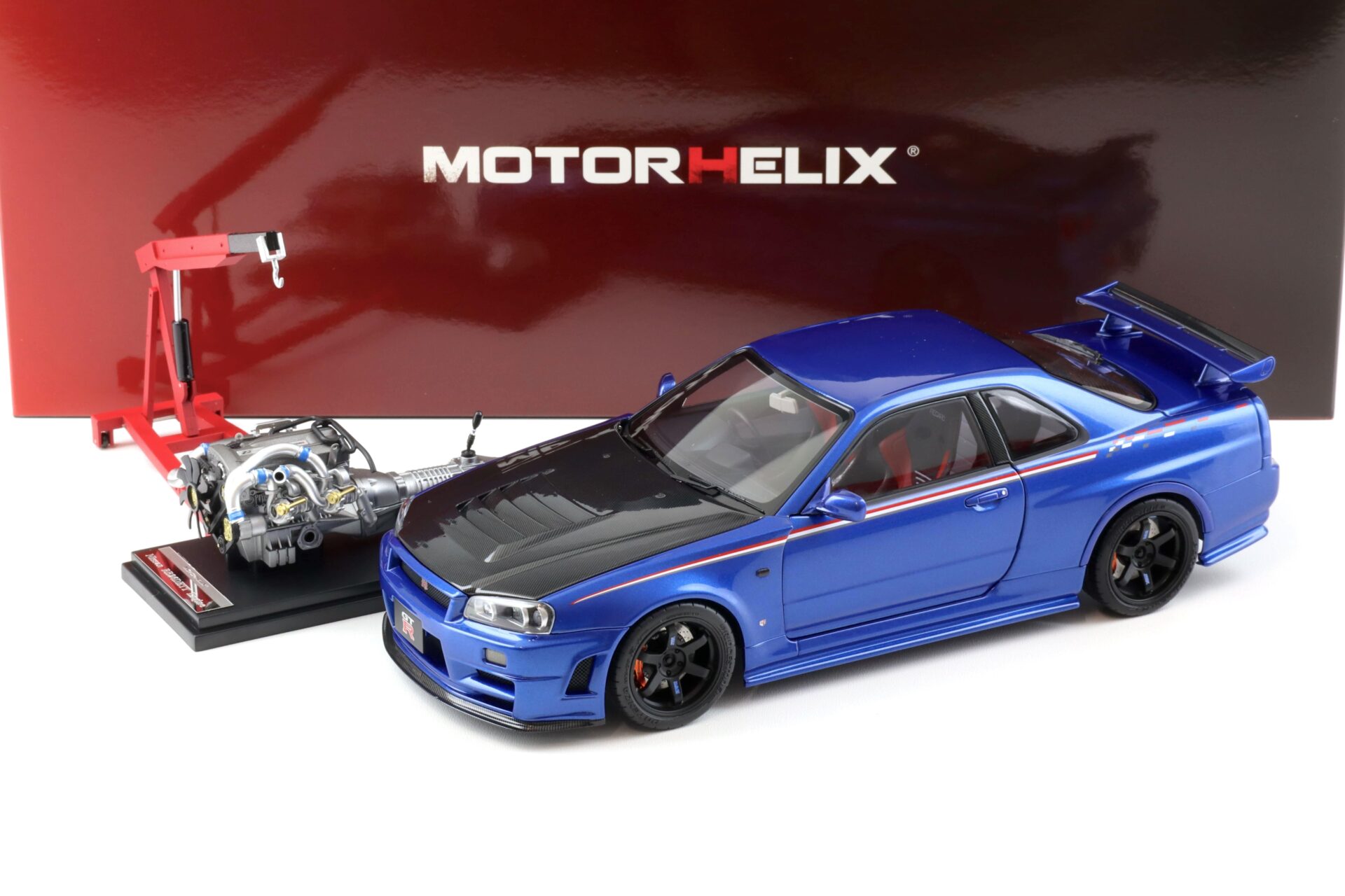 1:18 Motorhelix Nissan Skyline GT-R R34 Nismo CRS Bayside blue/ Carbon hood M83430