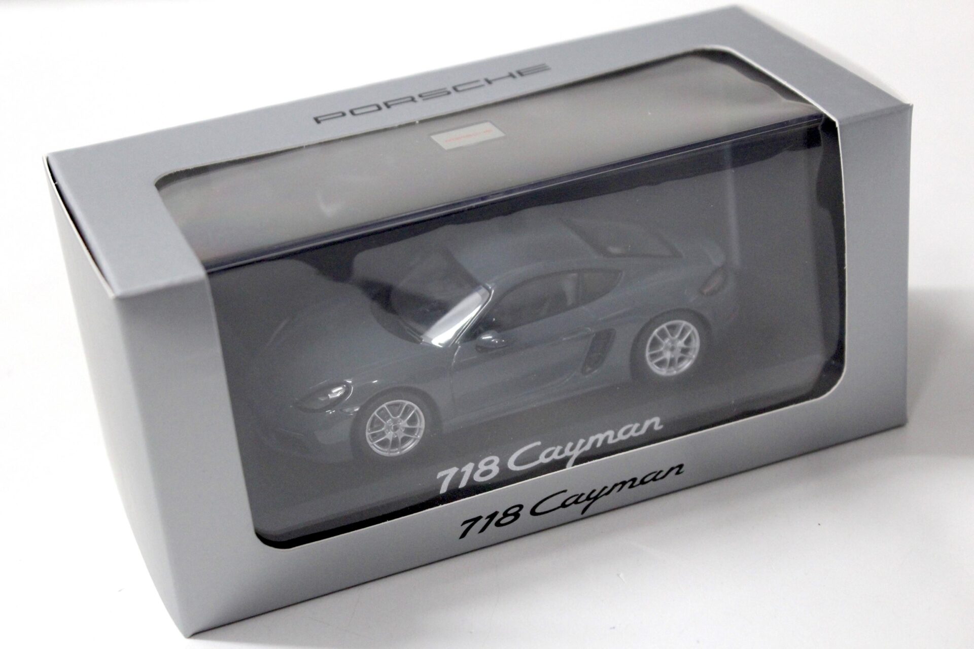 1:43 Minichamps Porsche 718 Cayman 2016 graphite blue metallic DEALER VERSION