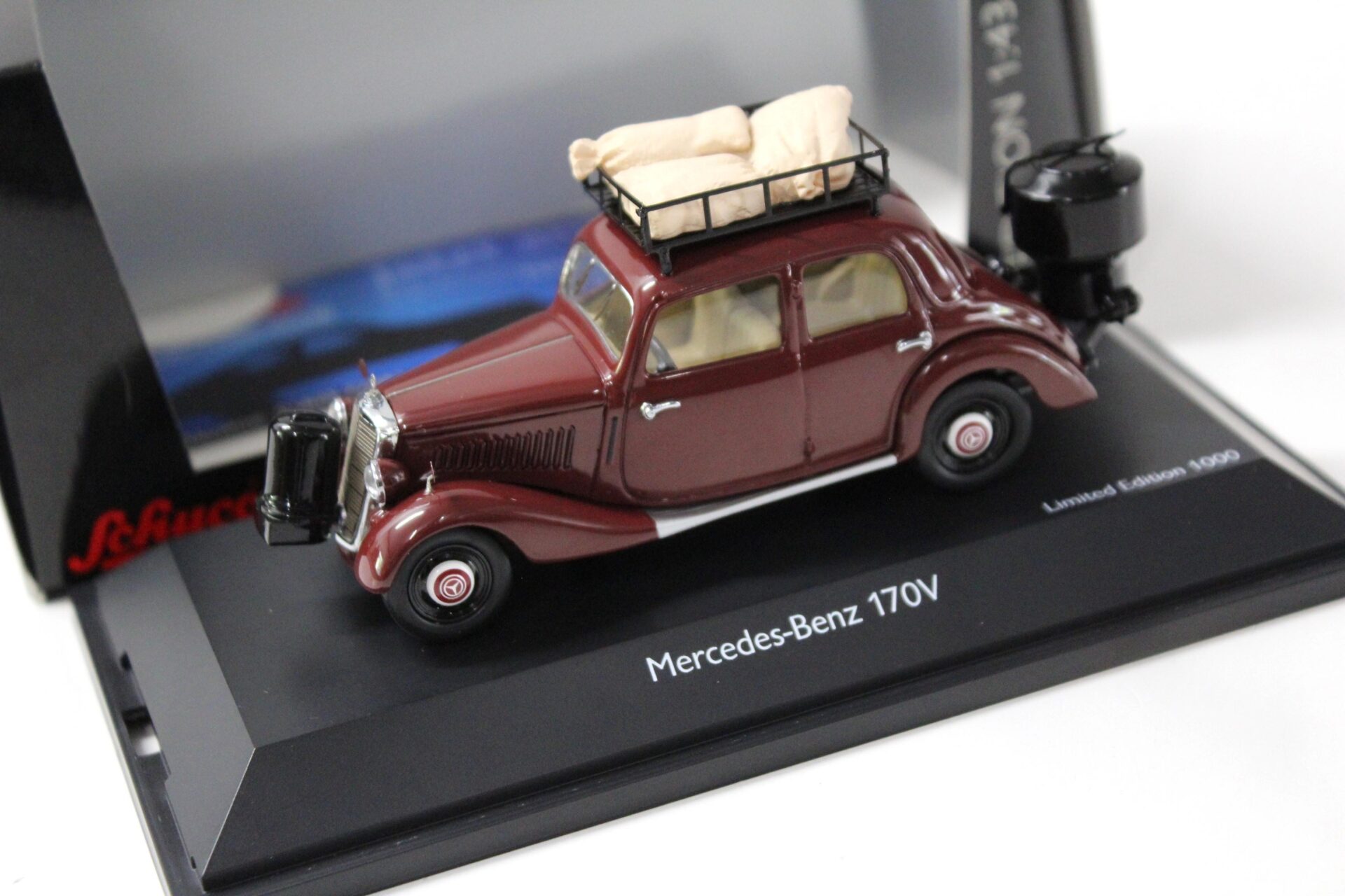 1:43 Schuco Mercedes 170V Limousine mit Holzvergaser dark red