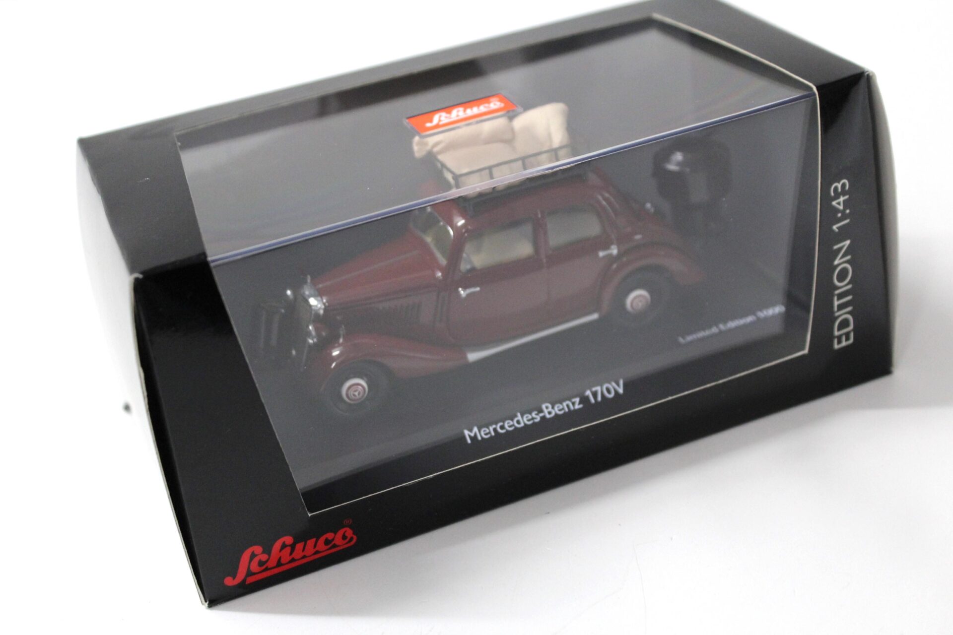 1:43 Schuco Mercedes 170V Limousine mit Holzvergaser dark red