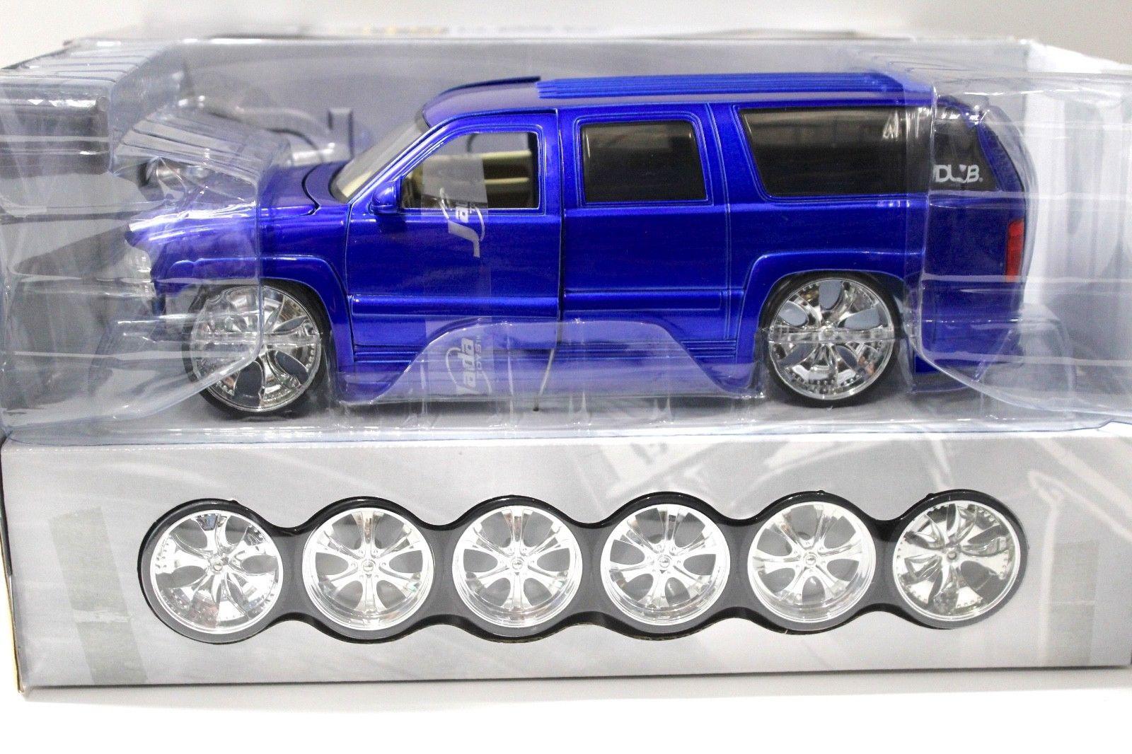 ID 45782 orig.jpg 1:18 Jada Chevrolet Suburban Dub CITY blue 2003 KIT/ Bausatz