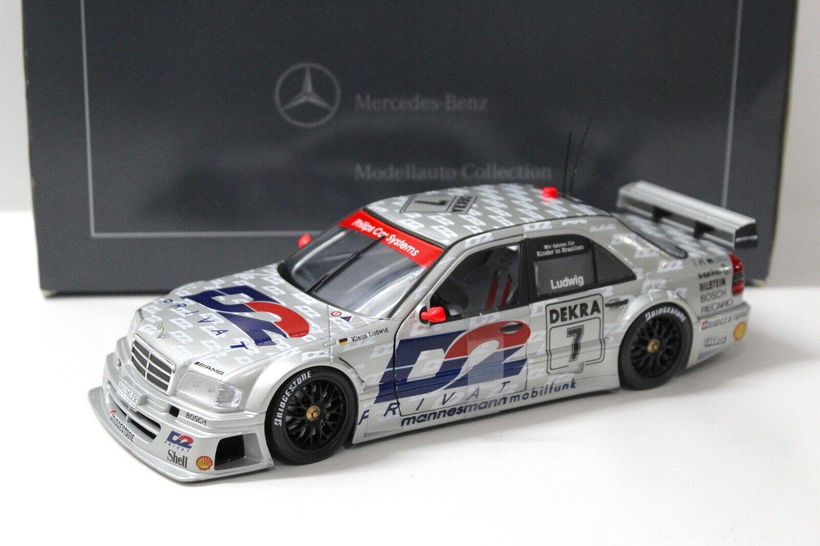 ID 46250 orig 1.jpg 1:18 UT Models Mercedes C-Klasse DTM AMG Ludwig #7 DEALER VERSION