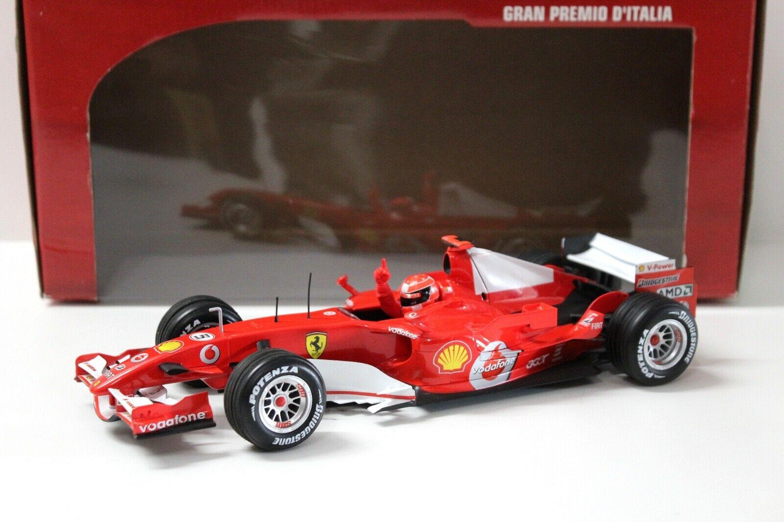 ID 46439 orig 1.jpg 1:18 Hot Wheels Ferrari 248 F1 Five Time World Champ M.Schumacher