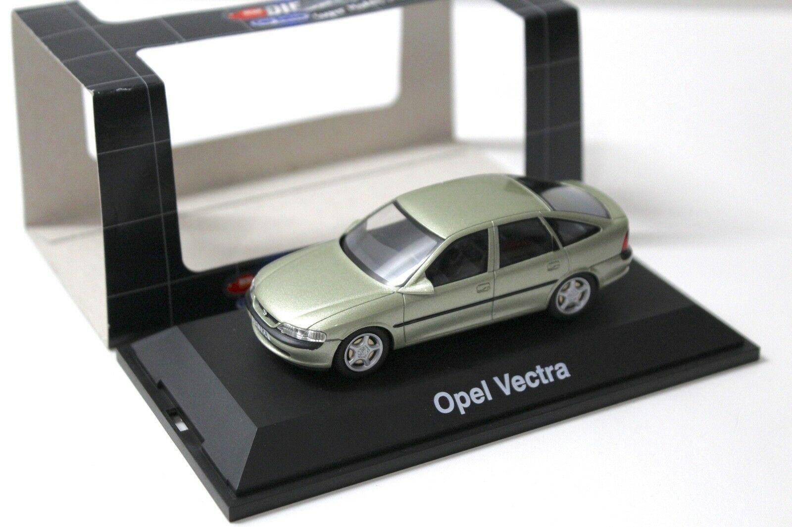 ID 47254 orig.jpg 1:43 Dickie Schuco Opel Vectra Sedan light green