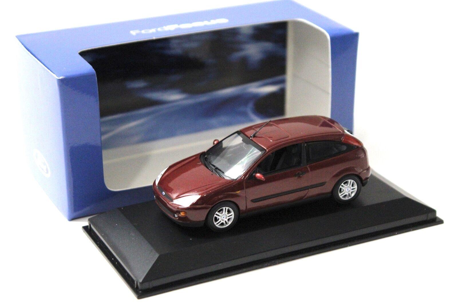 1:43 Minichamps Ford Focus Ghia 1999 dark red DEALER VERSION