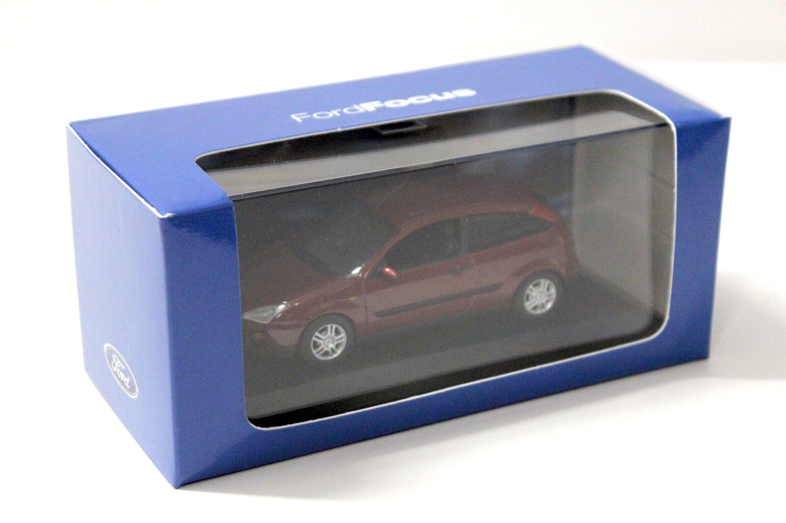 1:43 Minichamps Ford Focus Ghia 1999 dark red DEALER VERSION