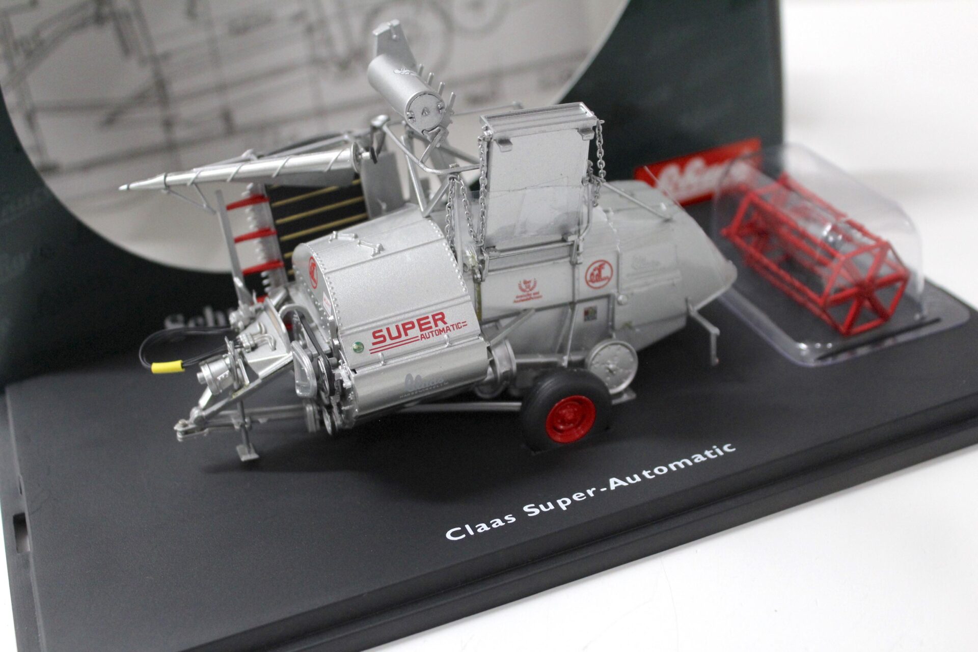 ID 47662 orig.jpg 1:43 Schuco Claas Super-Automatic Mähdrescher silver