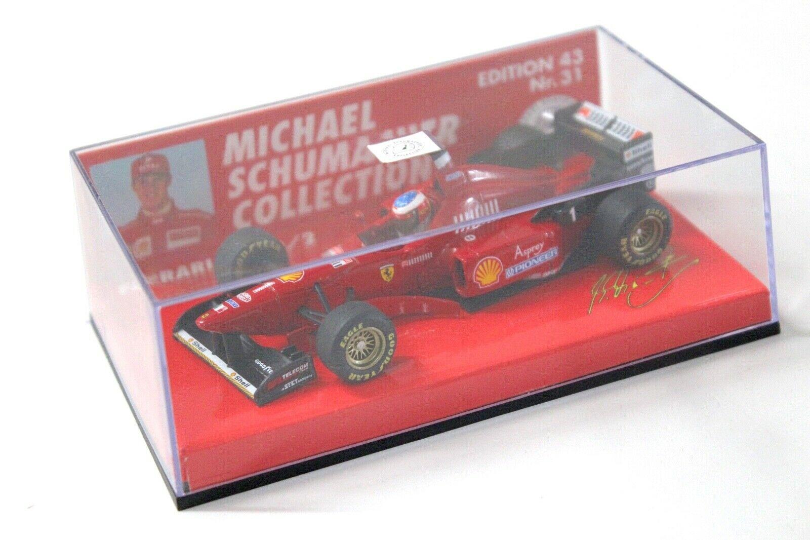 1:43 Minichamps F1 Ferrari F310/2 M.Schumacher #1