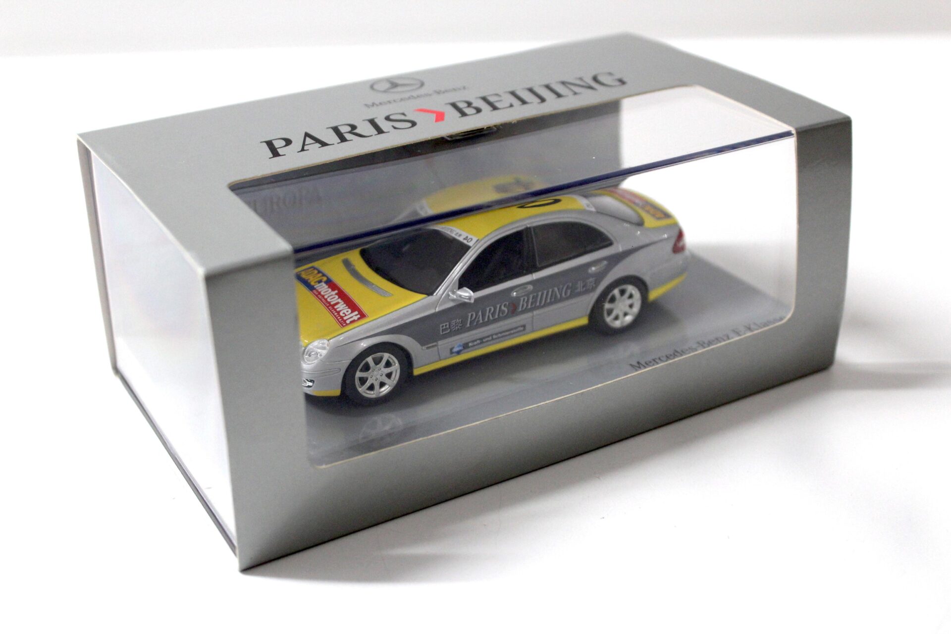 1:43 Minichamps Mercedes E-Klasse Limousine Rally Paris - Peking Team ADAC DEALER VERSION