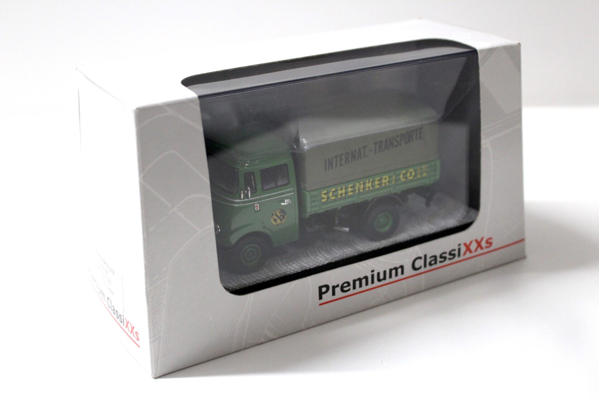 1:43 Premium ClassiXXs Mercedes L319 Pritsche/ Plane Schenkel green