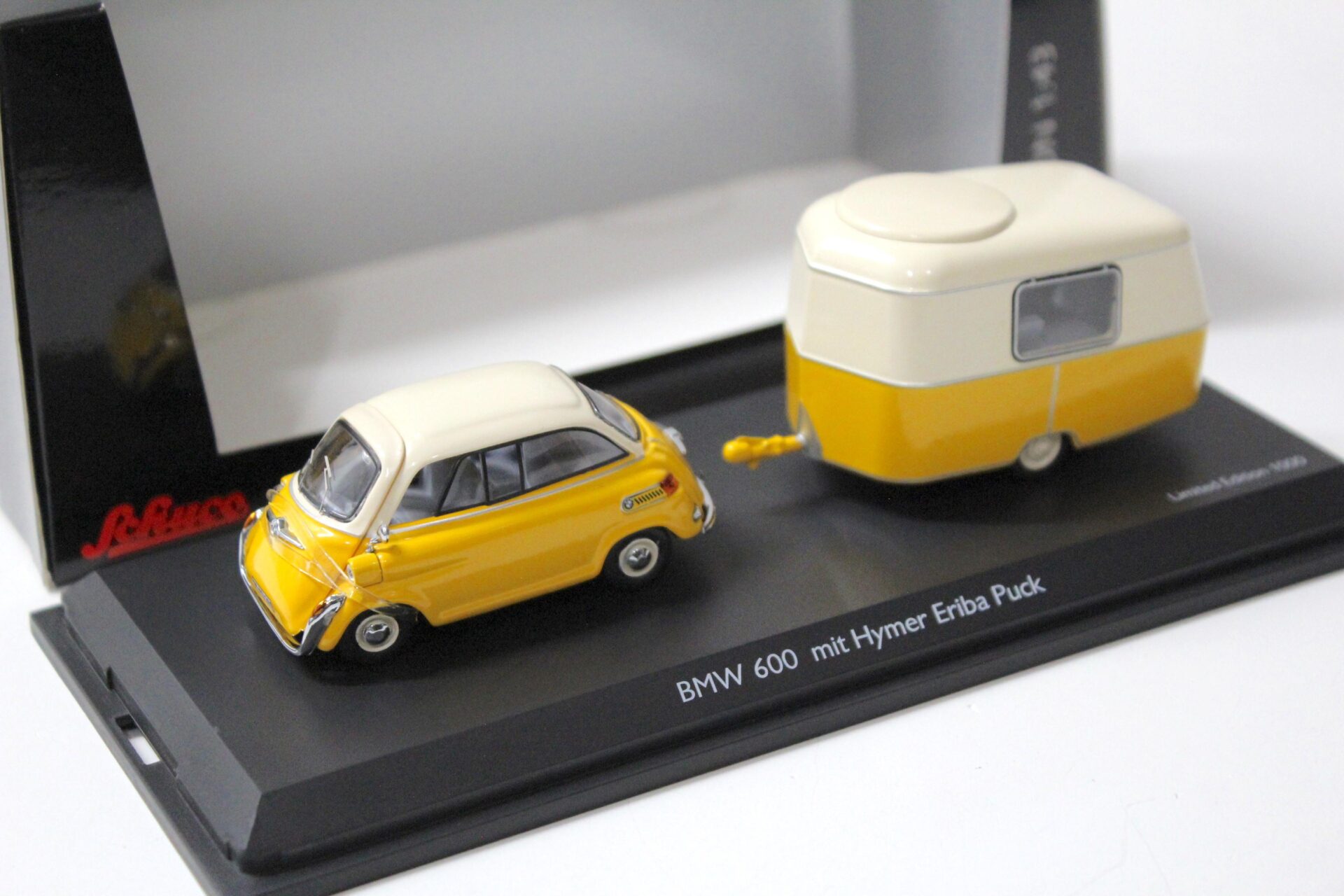 ID 57023 orig.jpg 1:43 Schuco BMW 600 mit Hymer Eriba Puck Wohnwagen yellow/ white