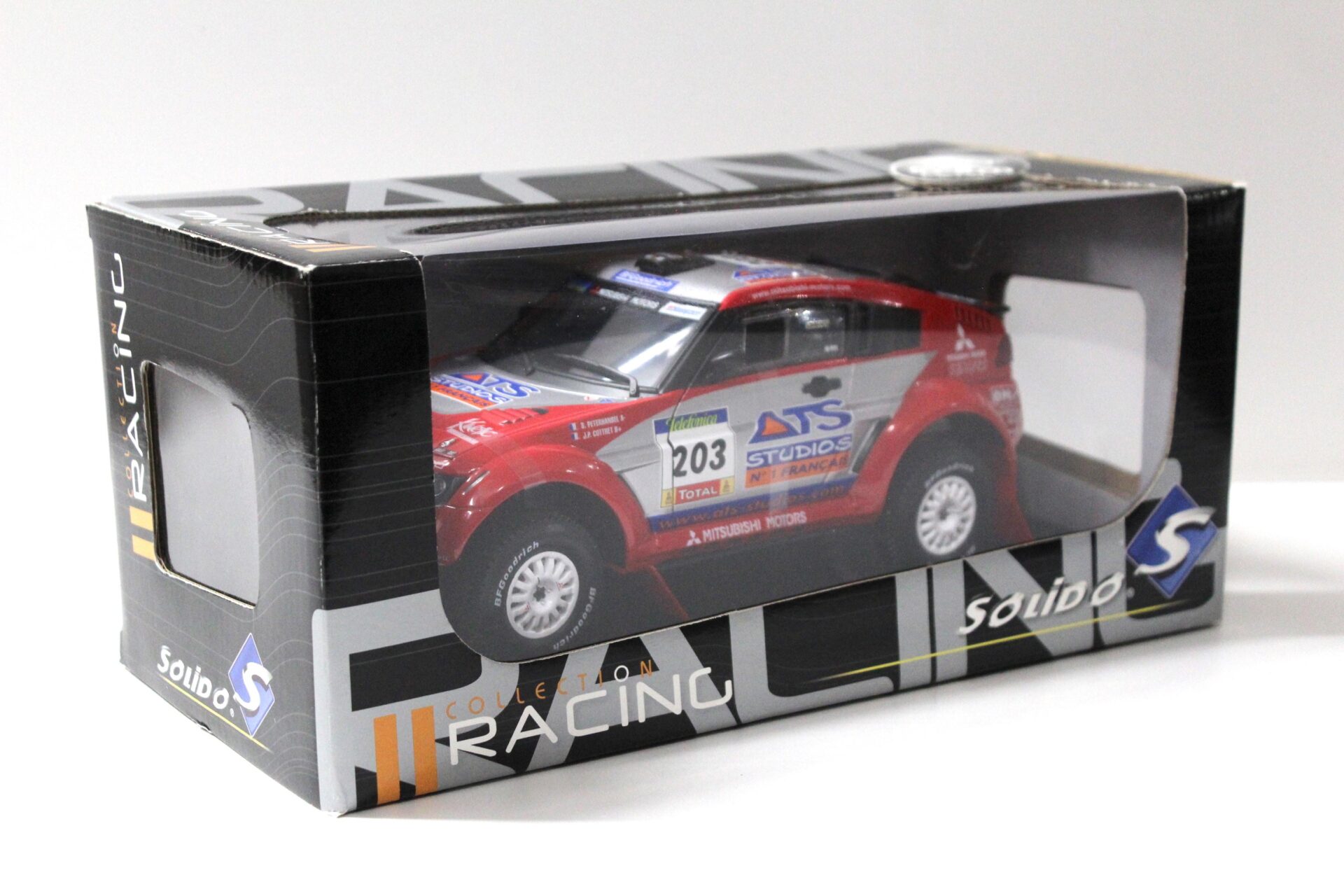 1:18 Solido Mitsubishi Pajero Evolution 2004 Rallye #203 Peterhansel/ Cottret