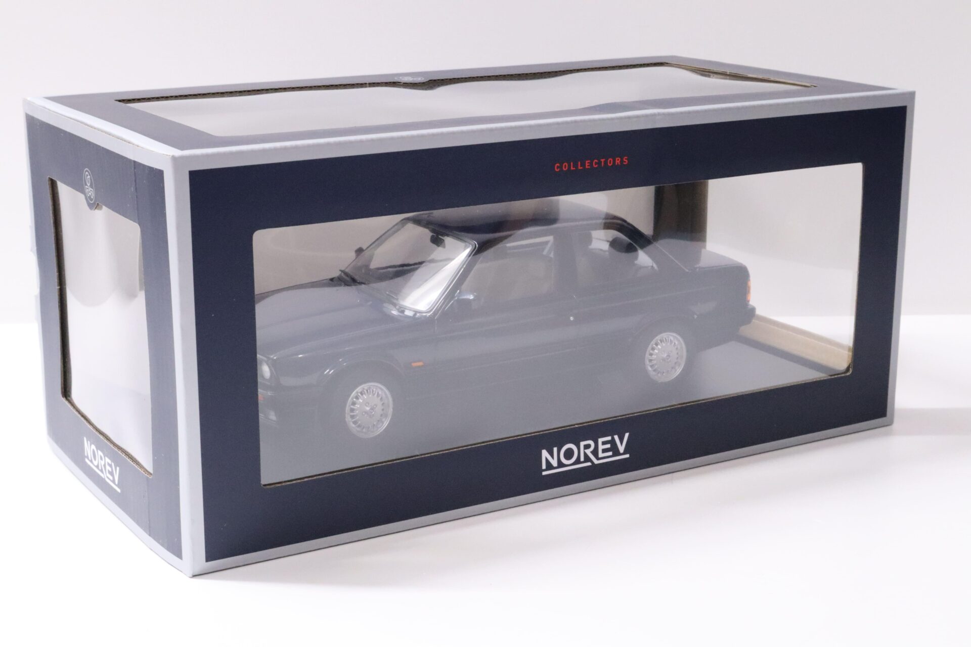 1:18 Norev BMW 325i (E30) Limousine 2-Door 1988 dark blue metallic