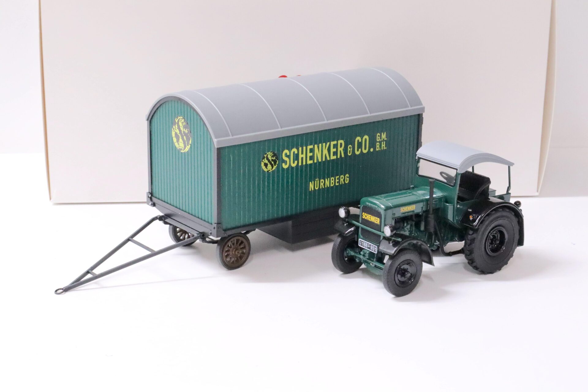 1:32 Schuco Deutz F3 mit Verdeck und Anhänger "Schenker" dark green