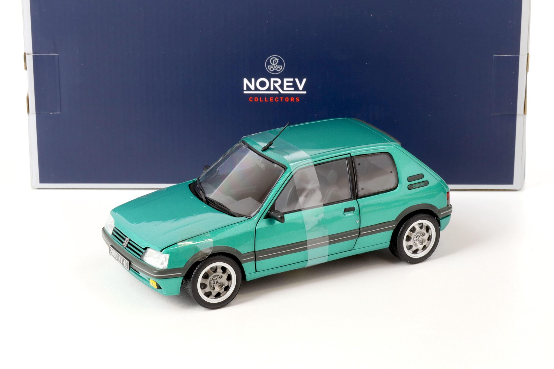 ID 67169 orig 1.jpg 1:18 Norev Peugeot 205 GTi 1.9 Griffe 1990 green metallic