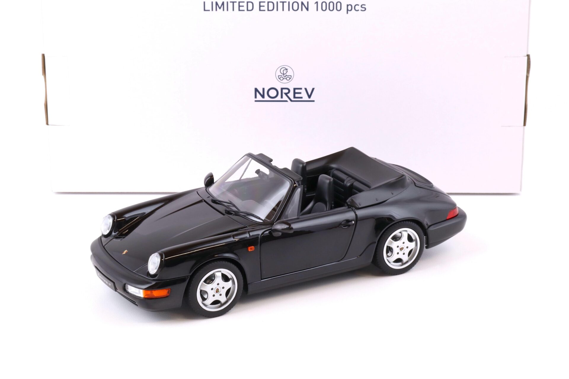 ID 74825 orig.jpg 1:18 Norev Porsche 911 (964) Carrera 4 Cabriolet 1990 black metallic - Limited 1000 pcs.