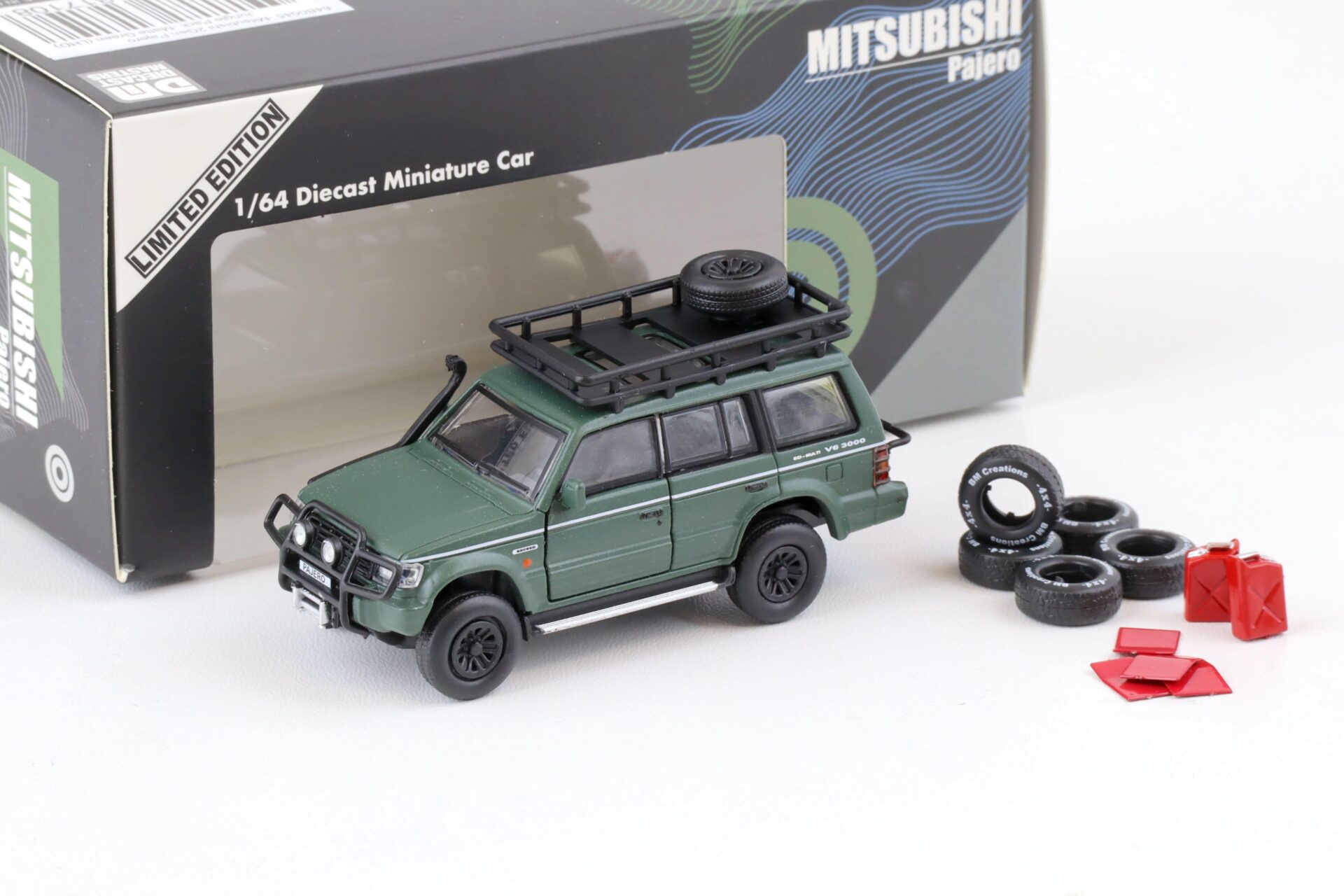 ID 75759 orig 1.jpg 1:64 BMC BM Creations 1996 Mitsubishi Pajero 2nd. Gen. LHD Jungle Pack matt green