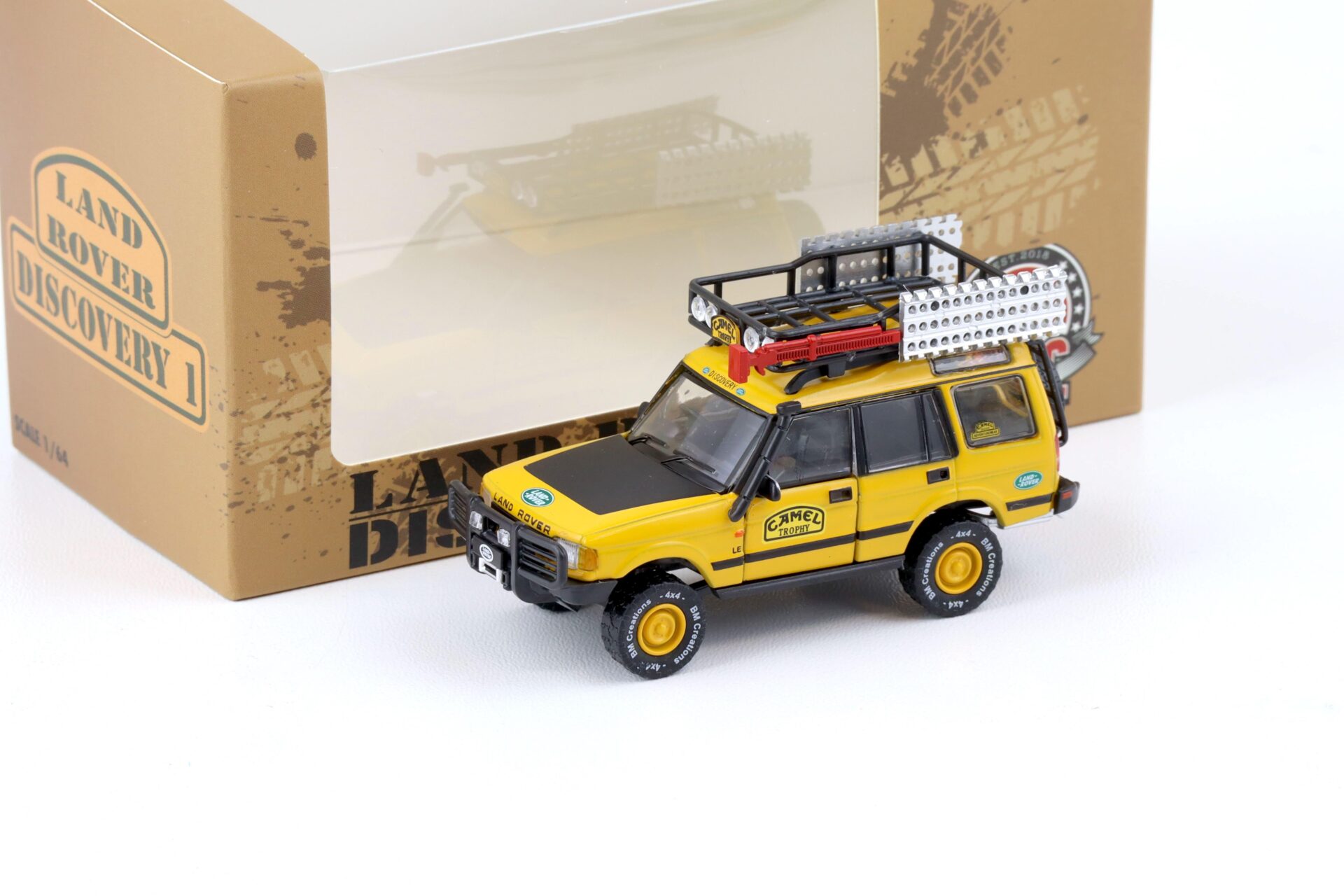 ID 75771 orig.jpg 1:64 BMC BM Creations 1998 Land Rover Discovery 1 RHD Camel Trophy yellow