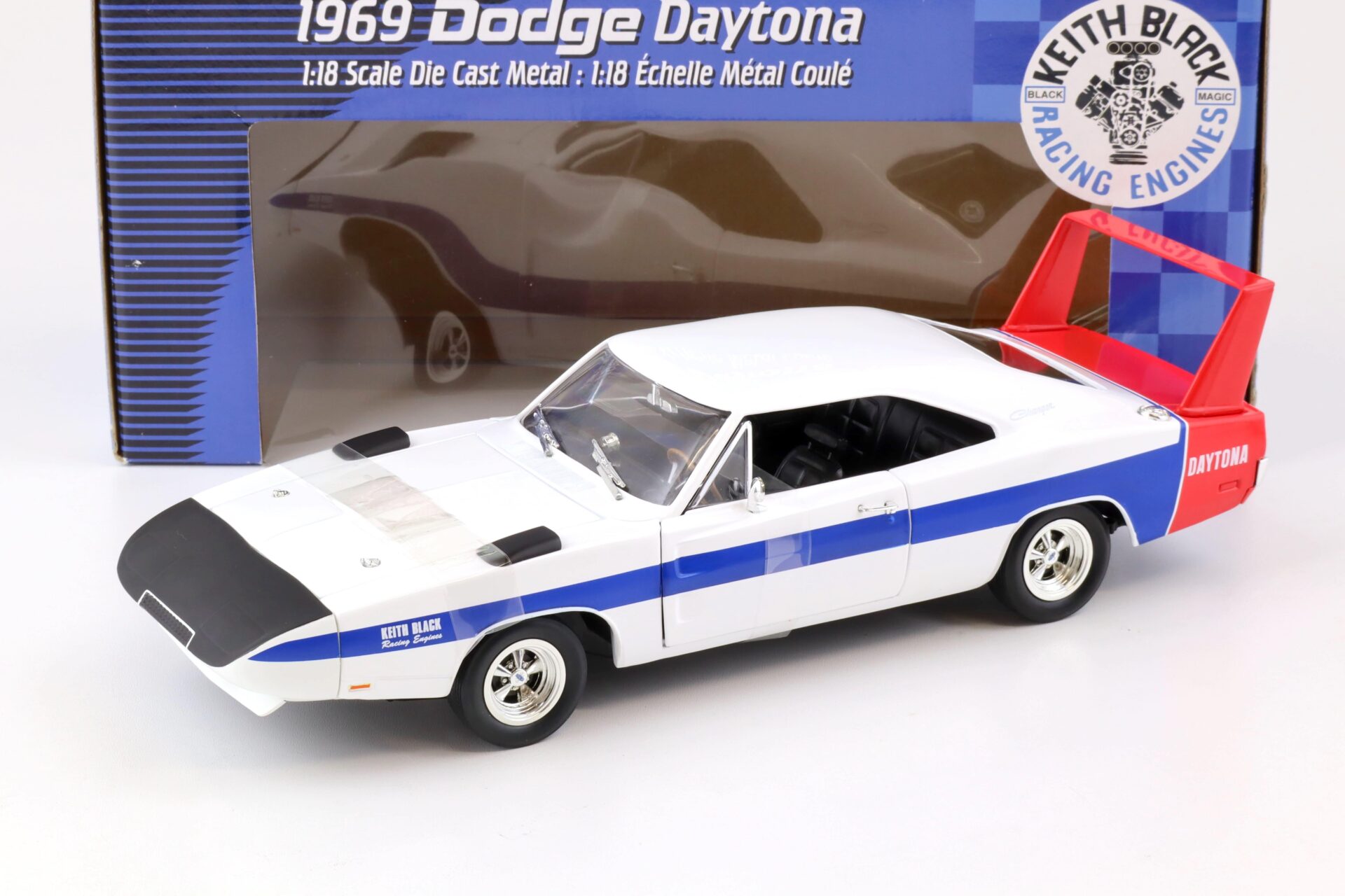 ID 75917 orig 1.jpg 1:18 ERTL 1969 Dodge Daytona Keith Black Racing Engines white/blue/red