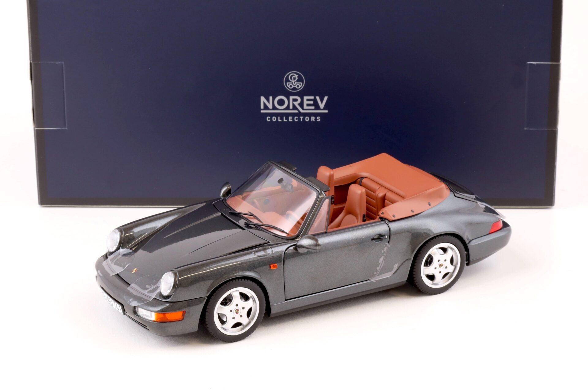 ID 76480 orig.jpg 1:18 Norev Porsche 911 (964) Carrera 2 Cabriolet 1990 grey metallic/ brown