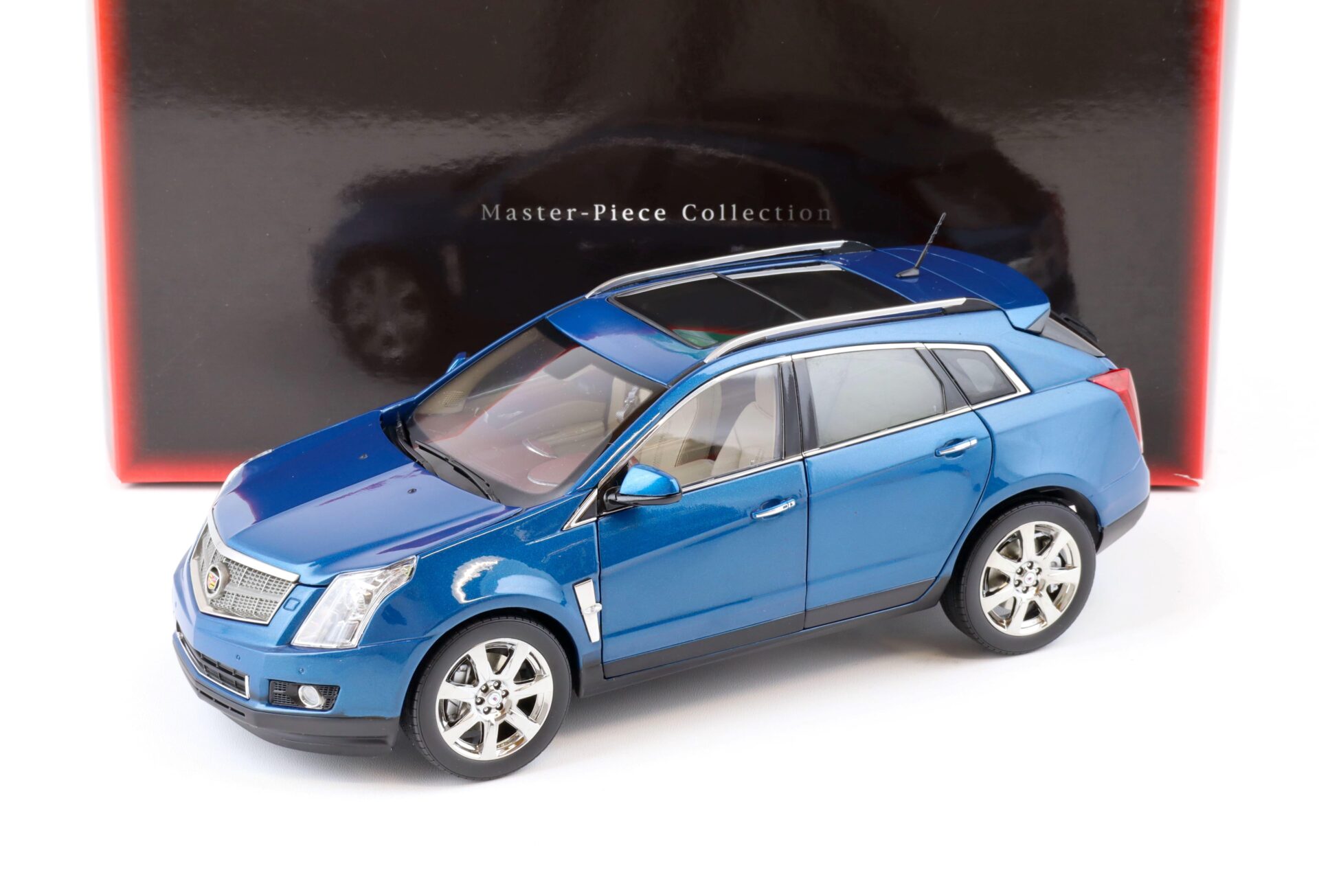 ID 76574 orig 1.jpg 1:18 Kyosho Cadillac SRX Crossover SUV blue metallic G003BL