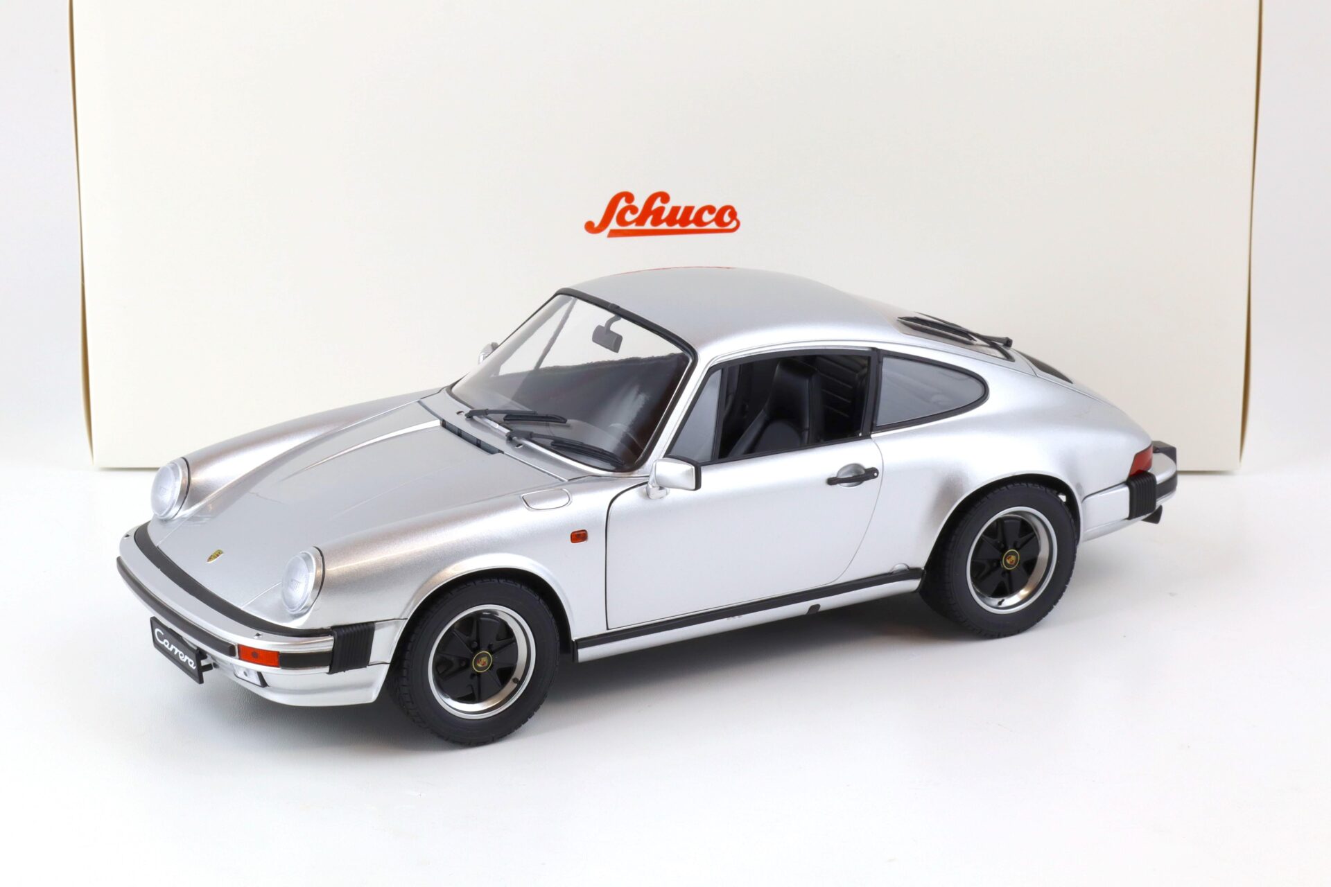 ID 77498 orig.jpg 1:12 Schuco Porsche 911 Carrera 3.2 Coupe silver metallic