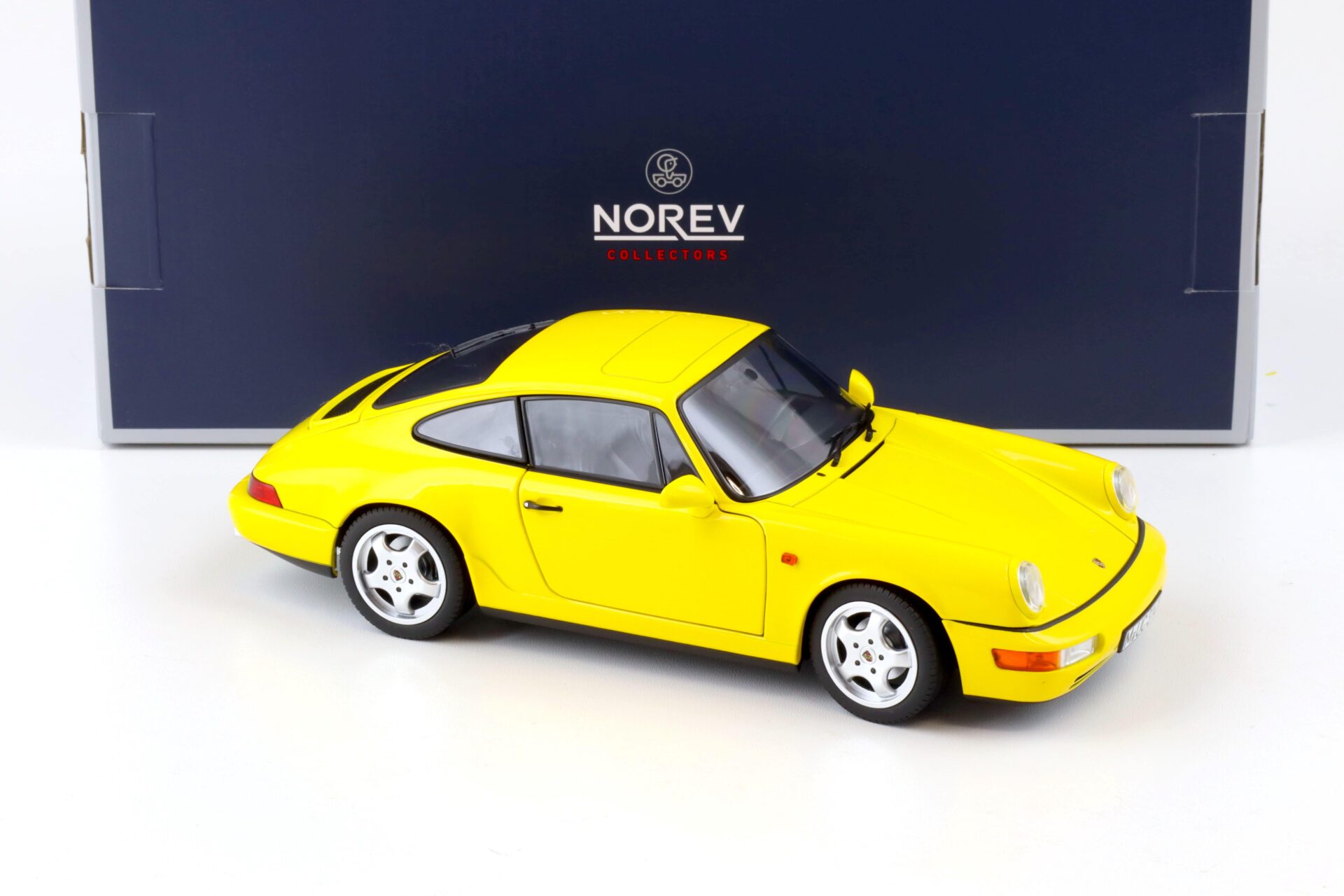 1:18 Norev Porsche 911 (964) Carrera 2 Coupe 1992 yellow