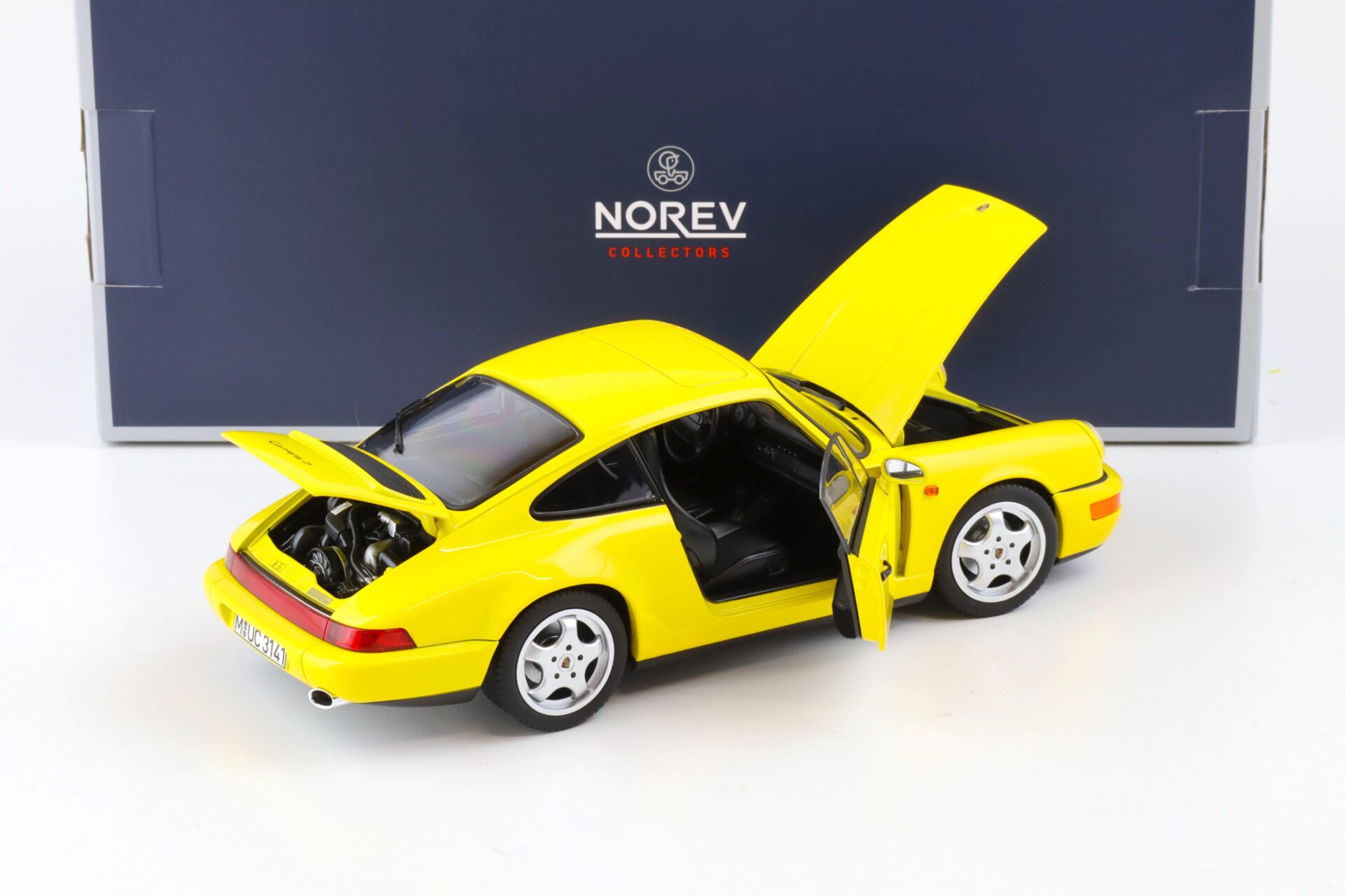 1:18 Norev Porsche 911 (964) Carrera 2 Coupe 1992 yellow