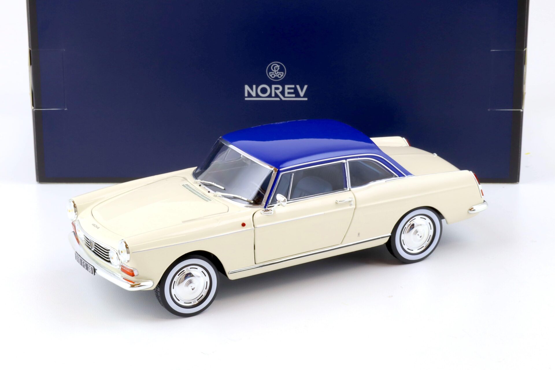 ID 80455 orig.jpg 1:18 Norev Peugeot 404 Coupe 1967 cream & blue - Limited 200 pcs.