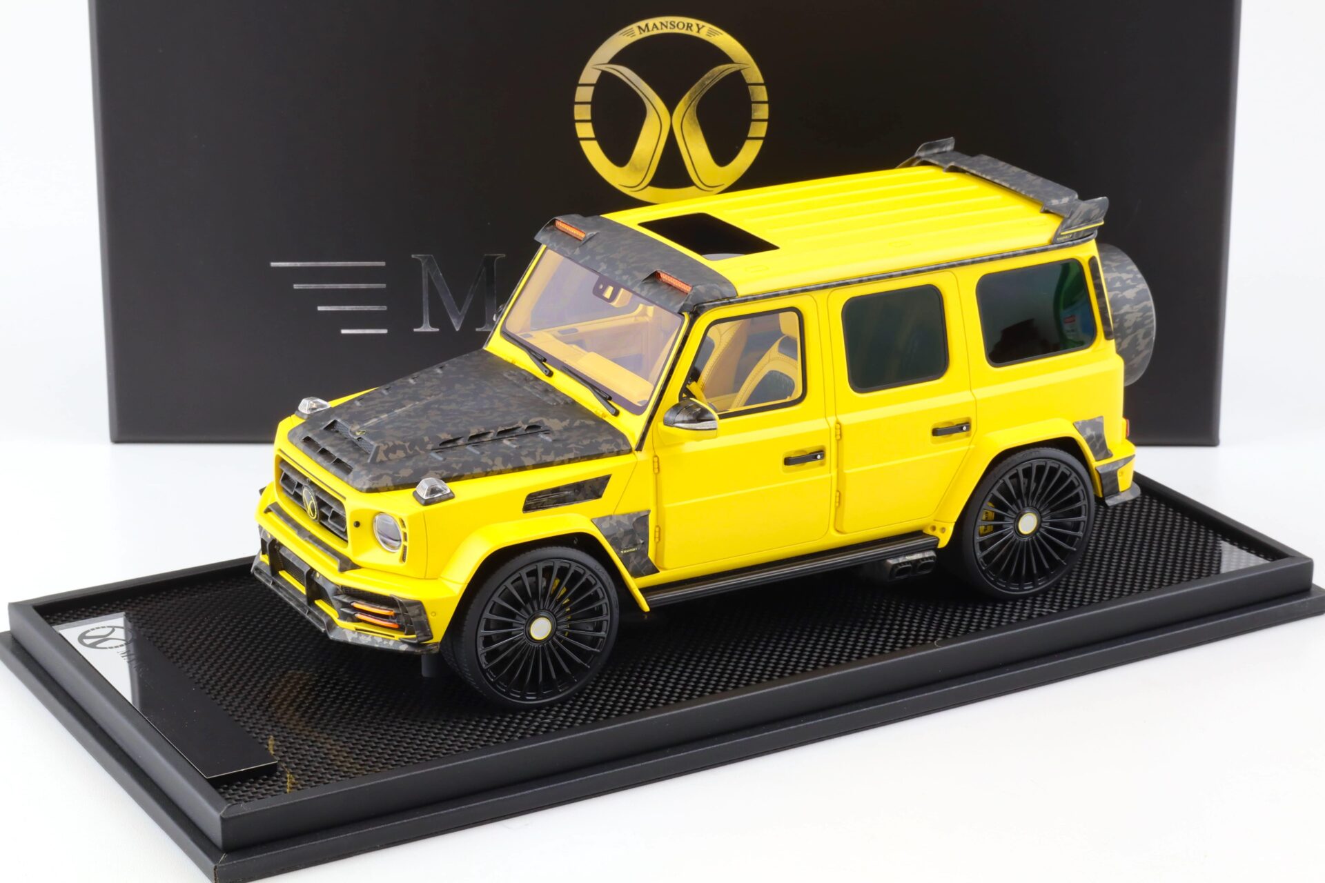 ID 81739 orig 1.jpg 1:18 Motorhelix Mercedes G-Class G63 AMG Mansory matt yellow - Limited 49 pcs.