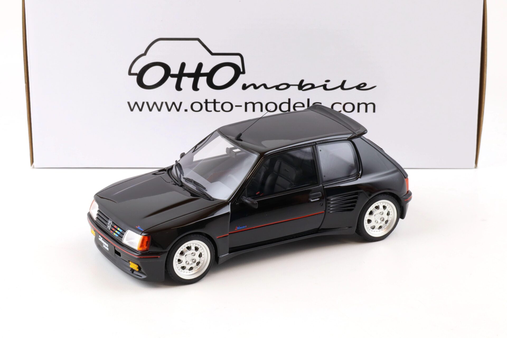 ID 82133 orig.jpg 1:18 OTTO mobile OT817 Peugeot 205 Dimma Edition 1 black/ silver wheels