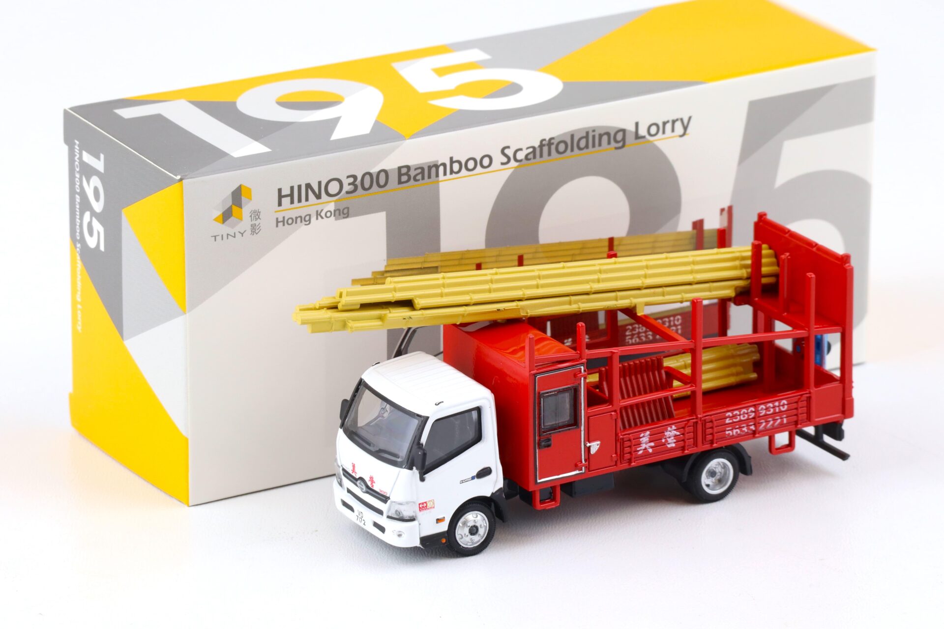 ID 85766 orig.jpg 1:64 TINY HINO 300 Bamboo Scaffolding Lorry LKW red/ white