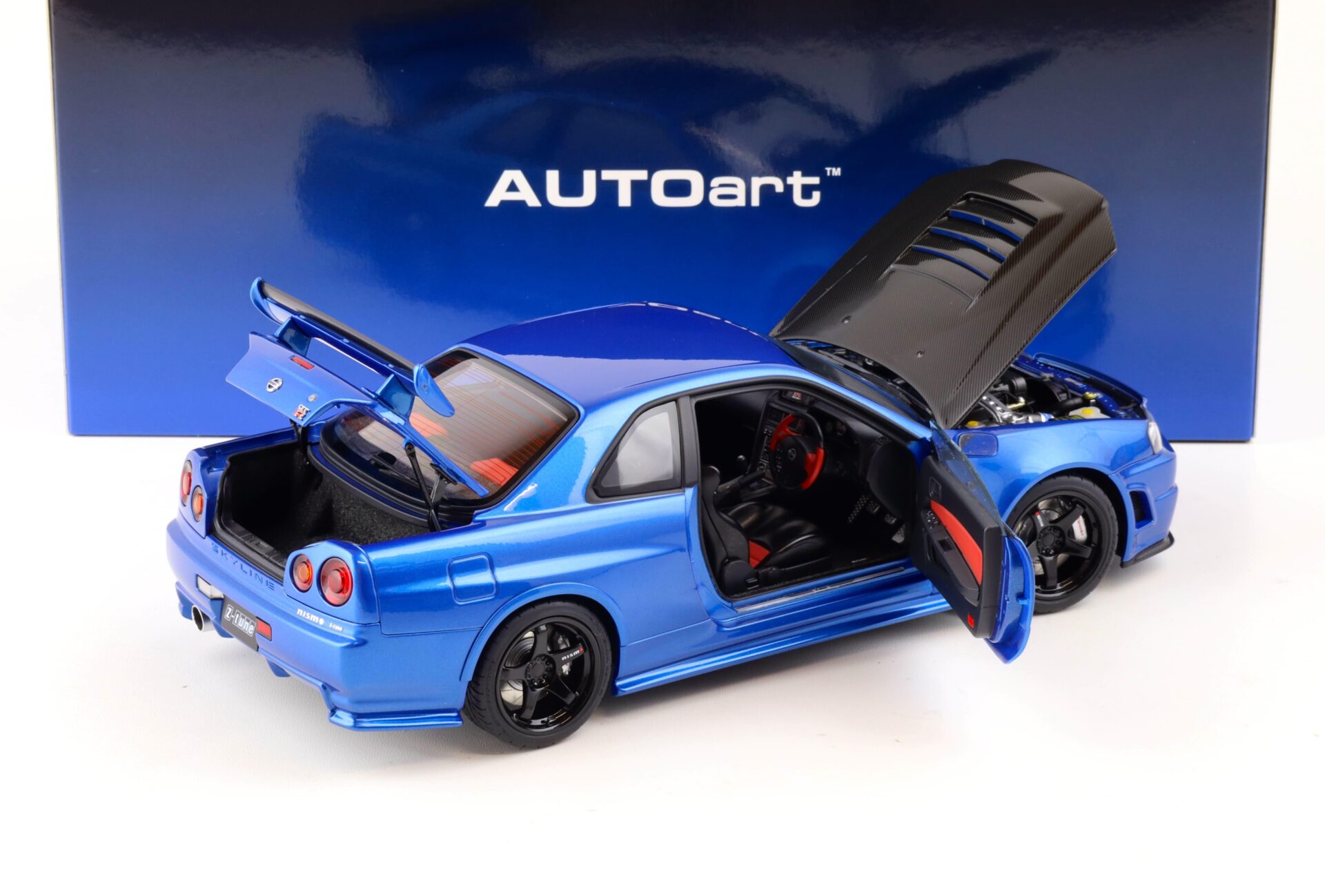 1:18 AUTOart Nissan Skyline GT-R (R34) Z-Tune 2005 Bayside blue/ w Carbon Bonnet 77460