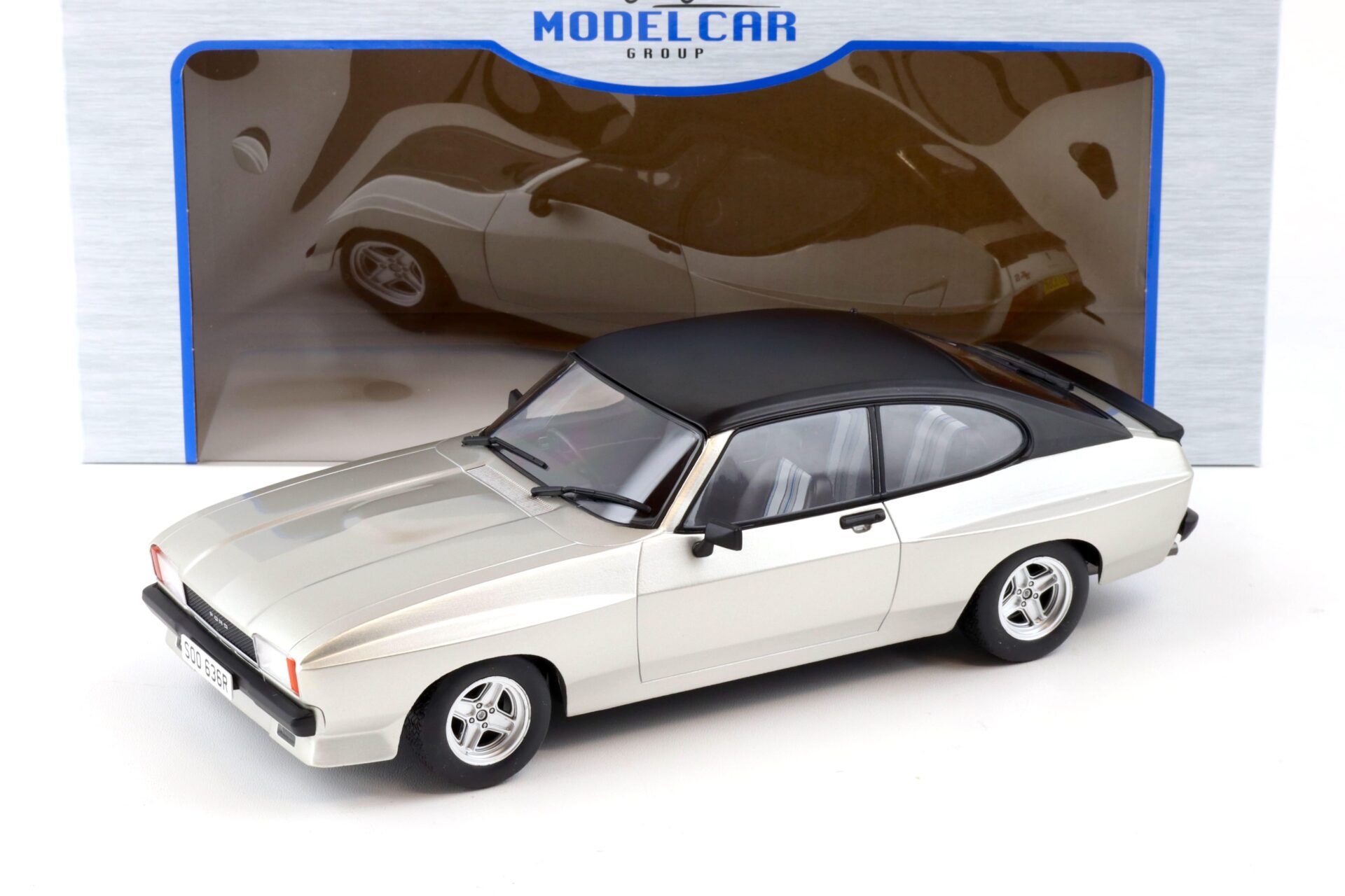 ID 87859 orig.jpg 1:18 MCG Ford Capri MK II X-Pack silver metallic/ black roof RHD 1975