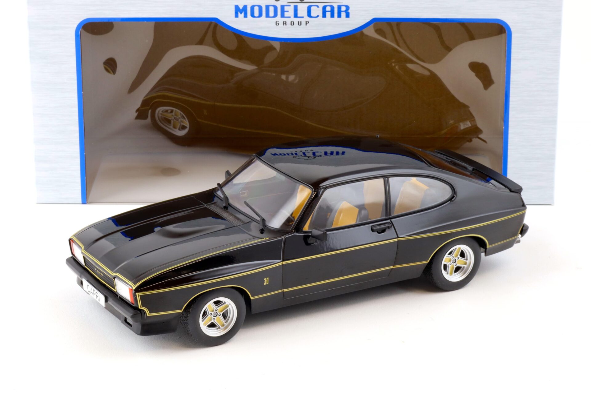 ID 87867 orig.jpg 1:18 MCG Ford Capri MK II X-Pack black/ gold stripes LHD 1975