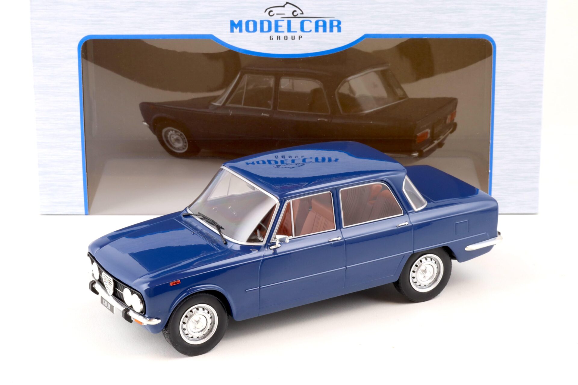 ID 88914 orig 1.jpg 1:18 MCG Alfa Romeo Giulia Nuova Super 1974 dark blue