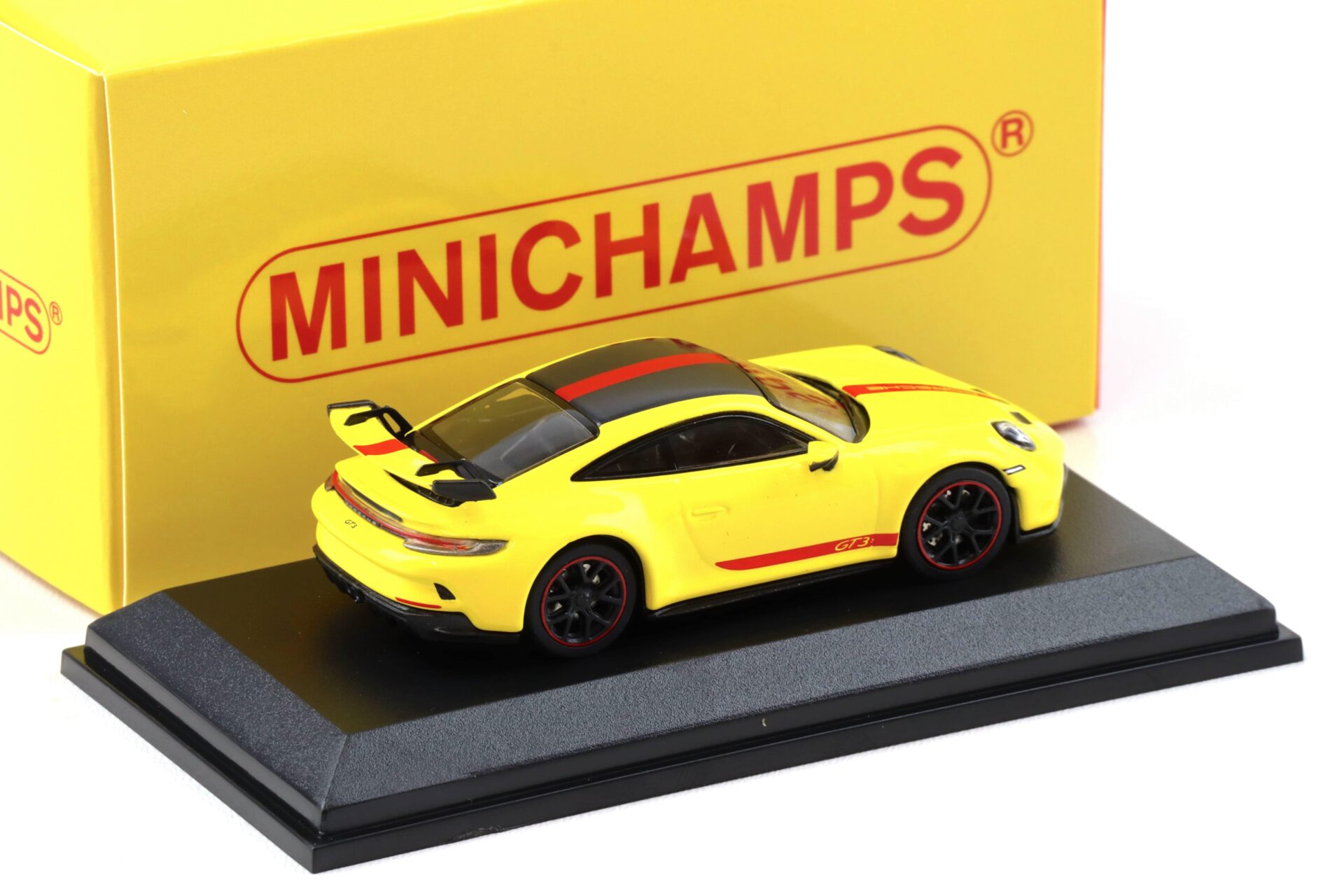 1:64 Minichamps Porsche 911 992 GT3 Coupe Racing yellow/ red stripes