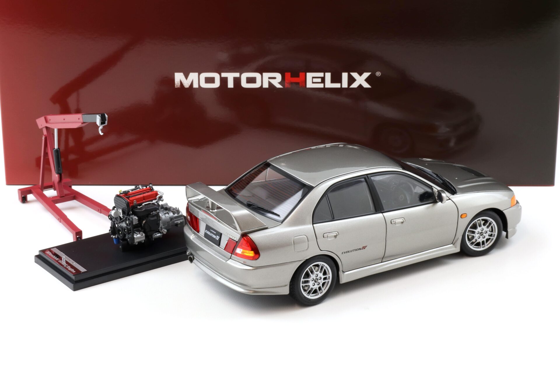 1:18 Motorhelix Mitsubishi Lancer EVO 4 IV Steel silver 1999 with engine M84001