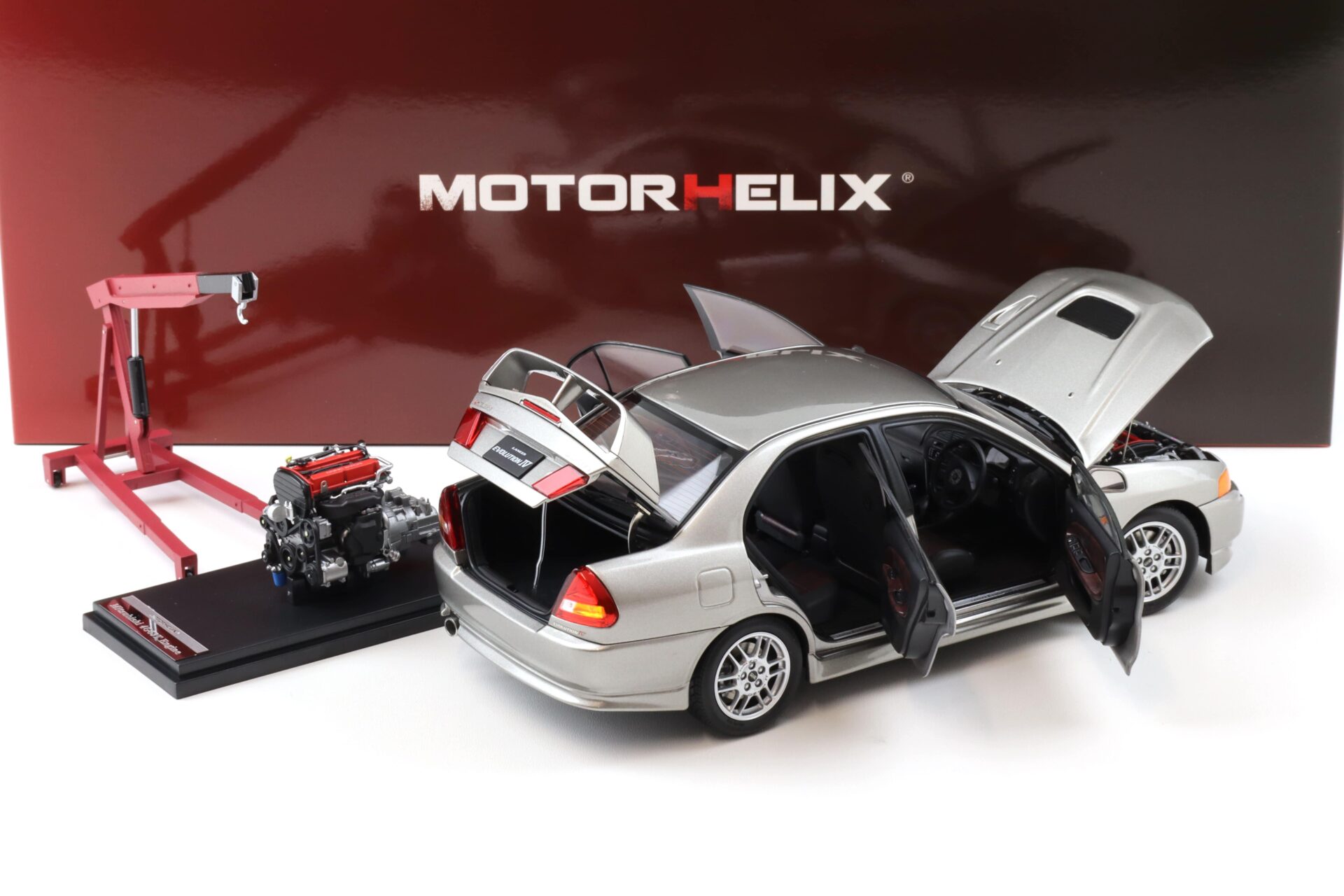 1:18 Motorhelix Mitsubishi Lancer EVO 4 IV Steel silver 1999 with engine M84001