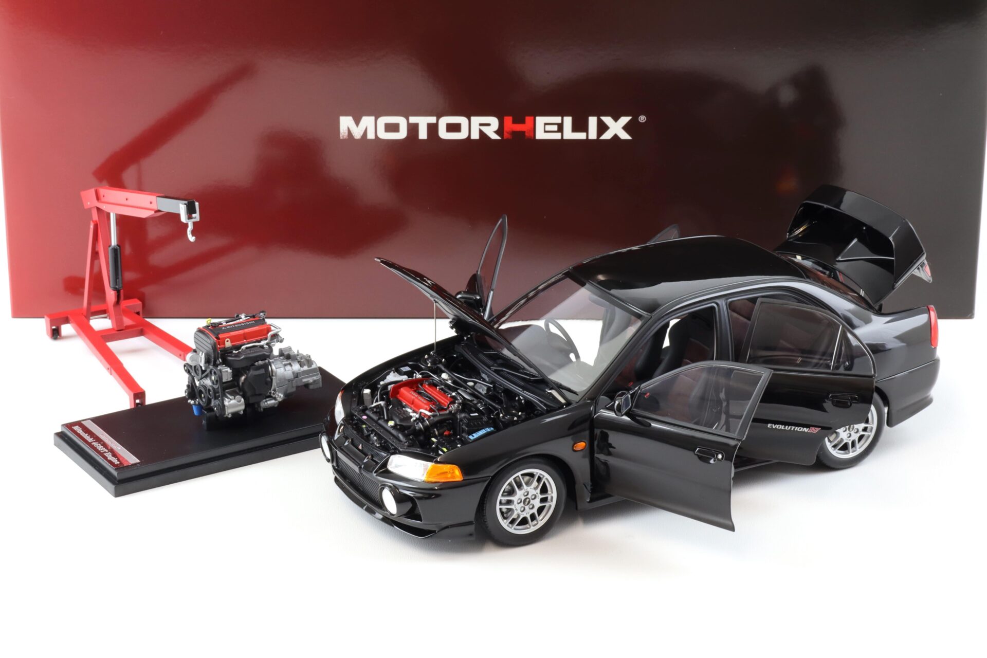 1:18 Motorhelix Mitsubishi Lancer EVO 4 IV Pyreness black 1999 with engine M84002