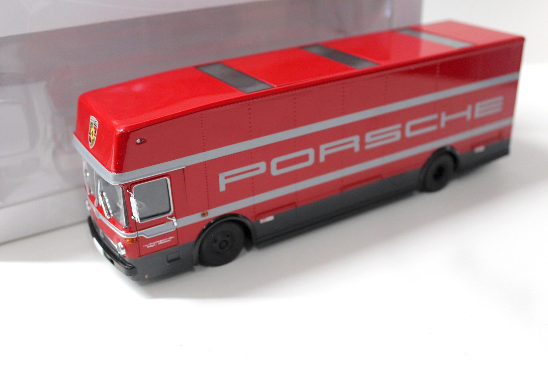 1:43 Premium ClassiXXs Mercedes O317 Renntransporter "PORSCHE" red