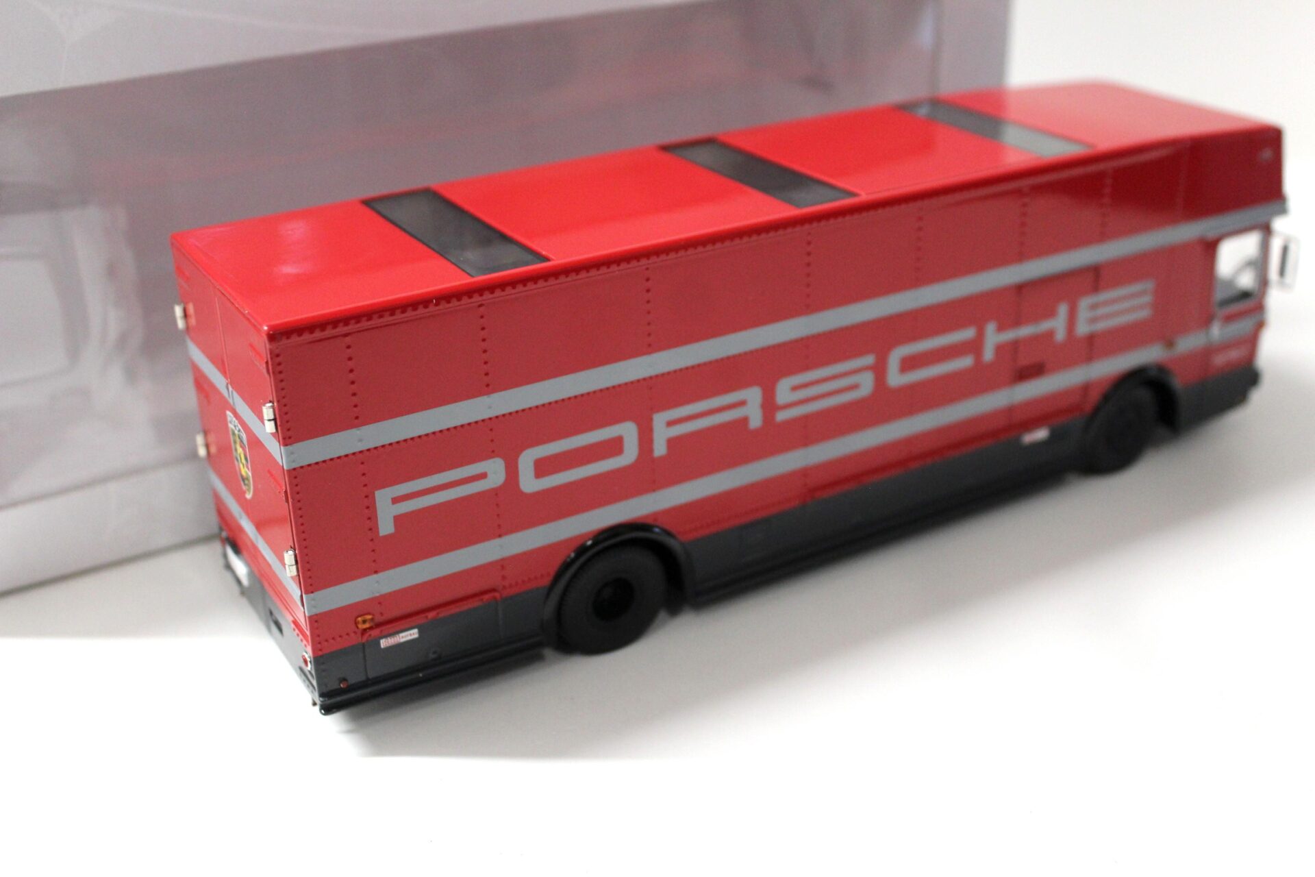1:43 Premium ClassiXXs Mercedes O317 Renntransporter "PORSCHE" red