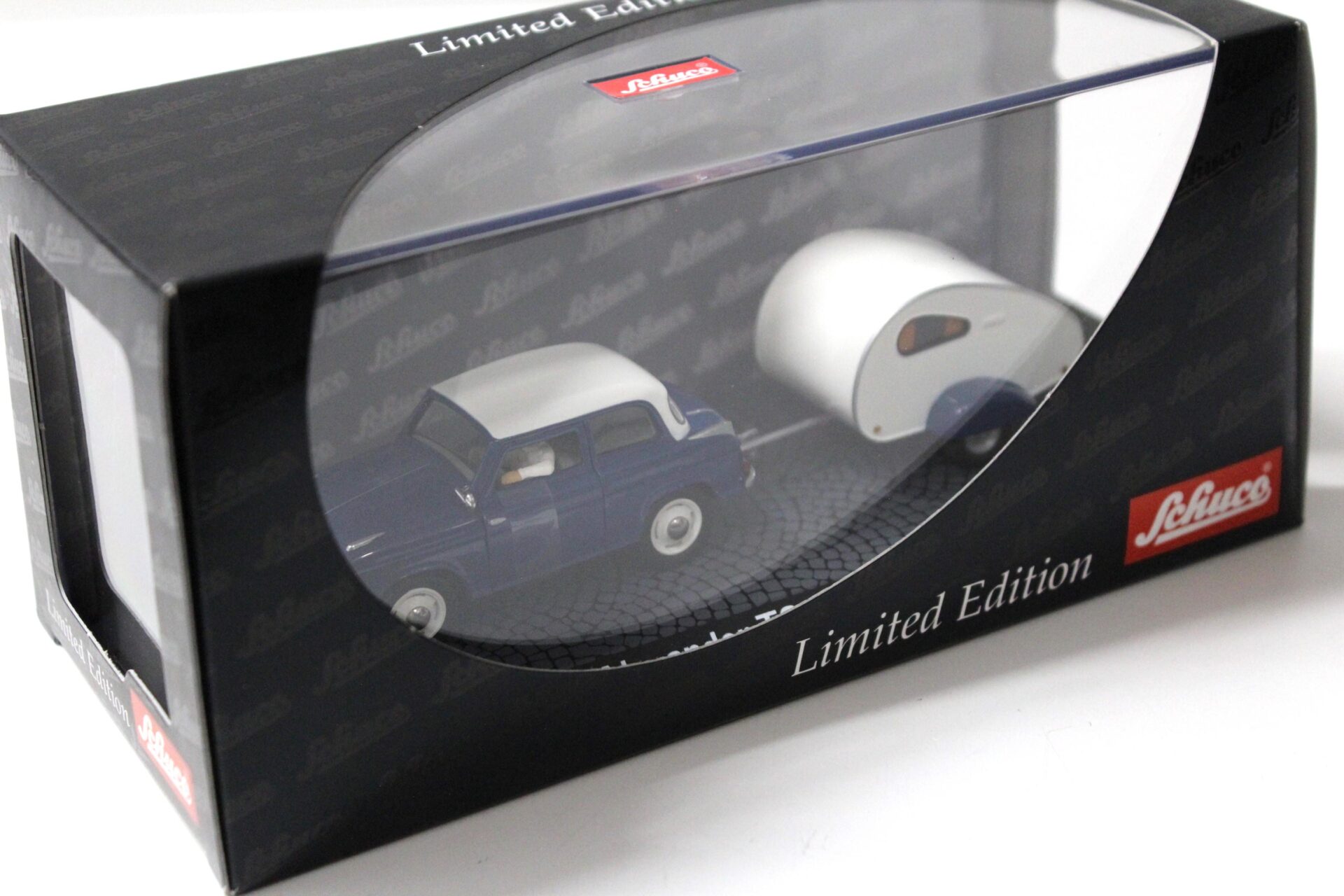 1:43 Schuco Lloyd Alexander TS mit Wohnanhänger blue/ white