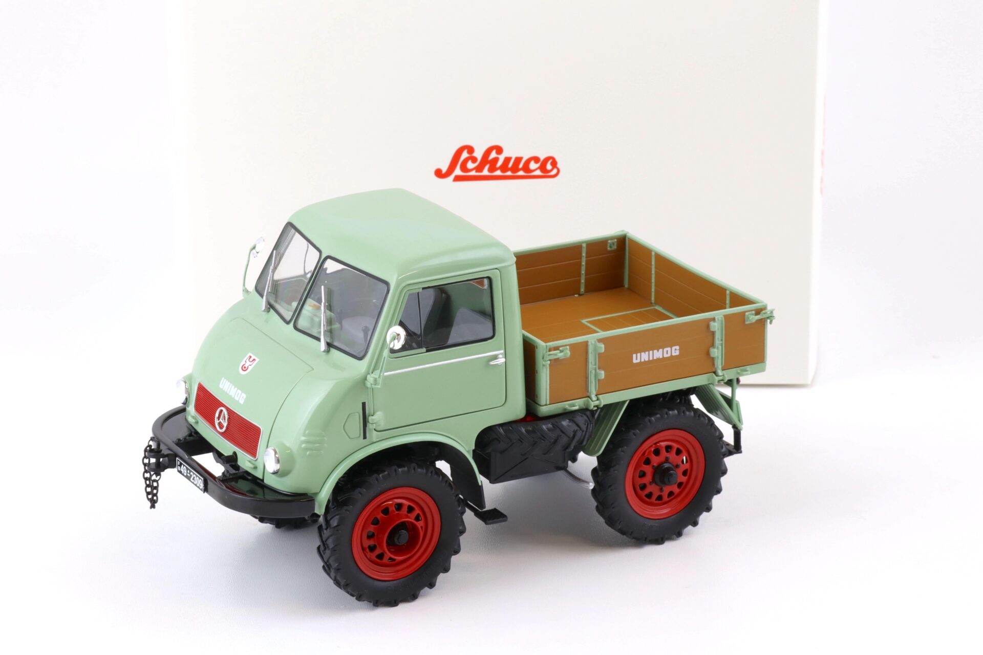 ID 75279 orig.jpg 1:18 Schuco Mercedes Unimog 401 mit Westfalia Kabine green 450017600