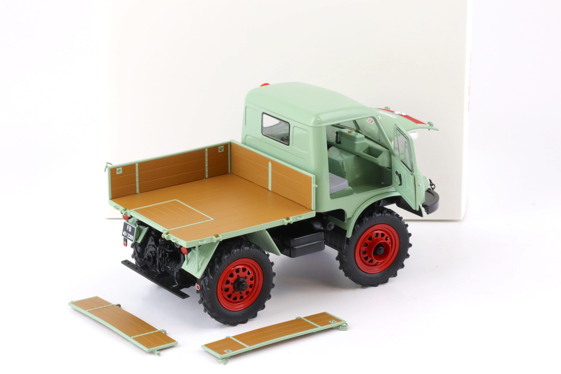 1:18 Schuco Mercedes Unimog 401 mit Westfalia Kabine green 450017600
