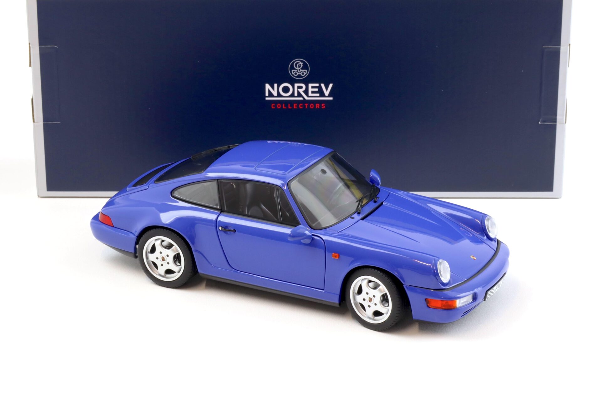 1:18 Norev Porsche 911 (964) Carrera 4 Coupe 1990 Maritim blue - Limited 504 pcs.