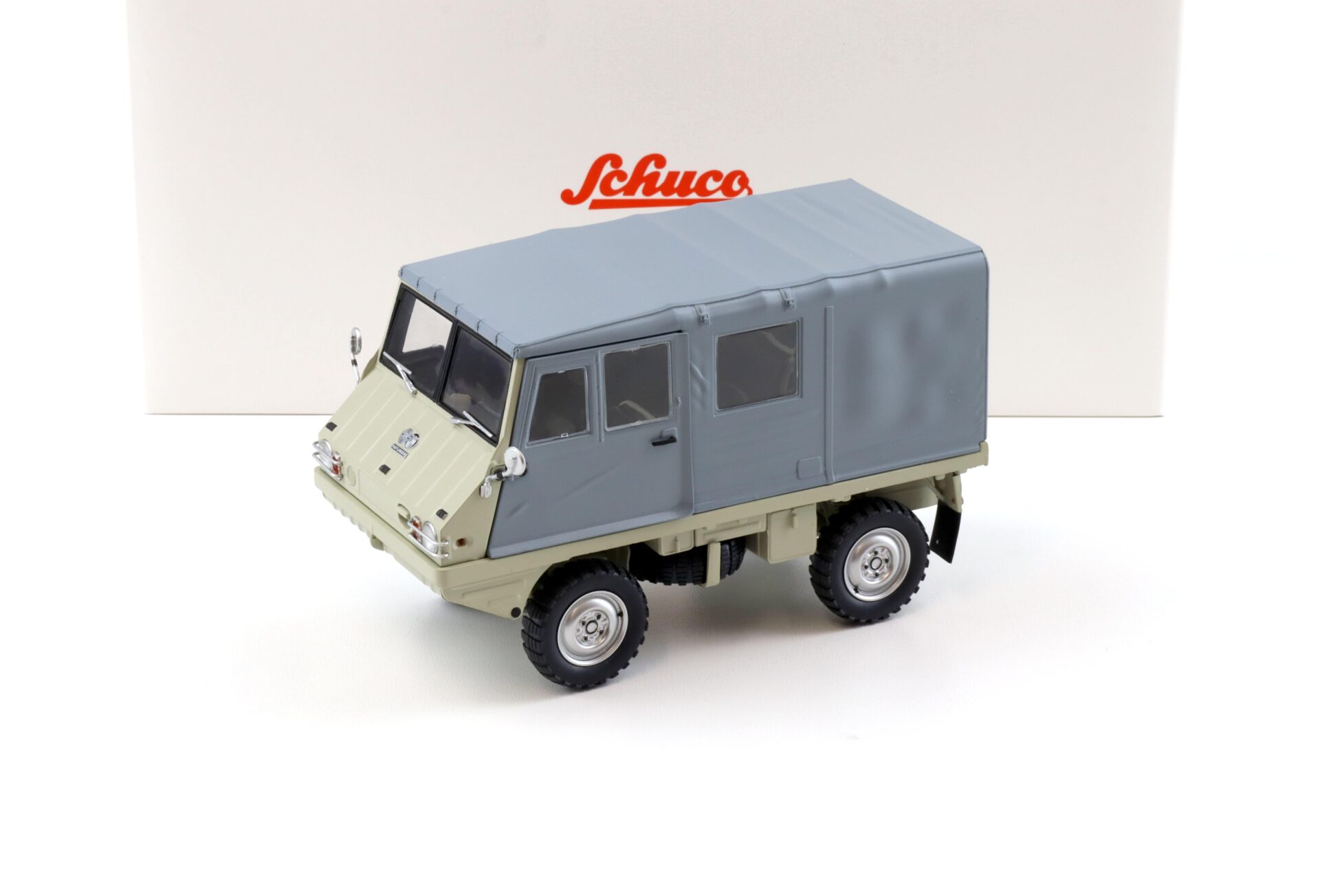 1:18 Schuco Styr-Puch Halfinger 4x4 beige/ grey